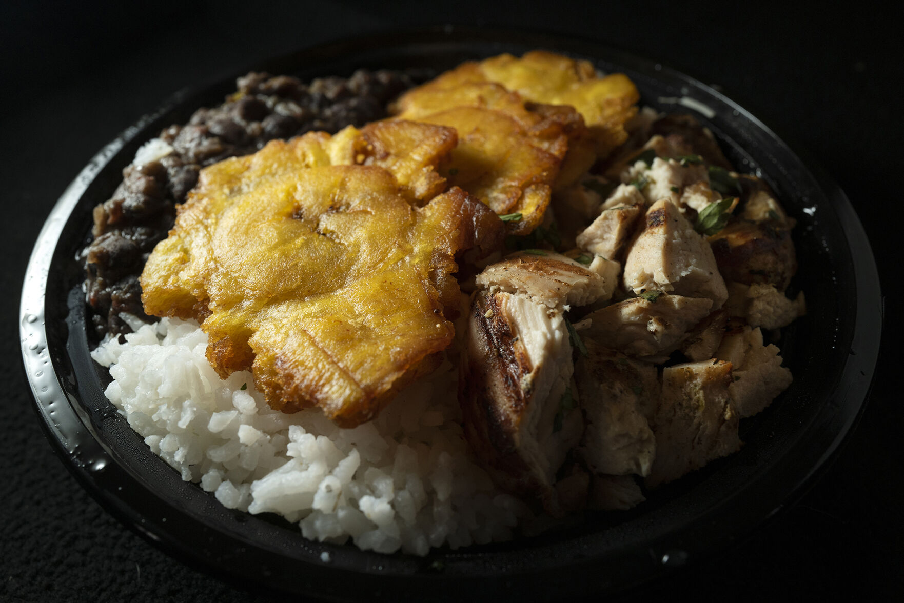 Kariacos Restaurant (Located at: 1169 N. Circle Dr.) “Chicken Bowl To-Go” Tuesday April 25, 2023. Photo by Jeff Kearney. (Jeff Kearney)