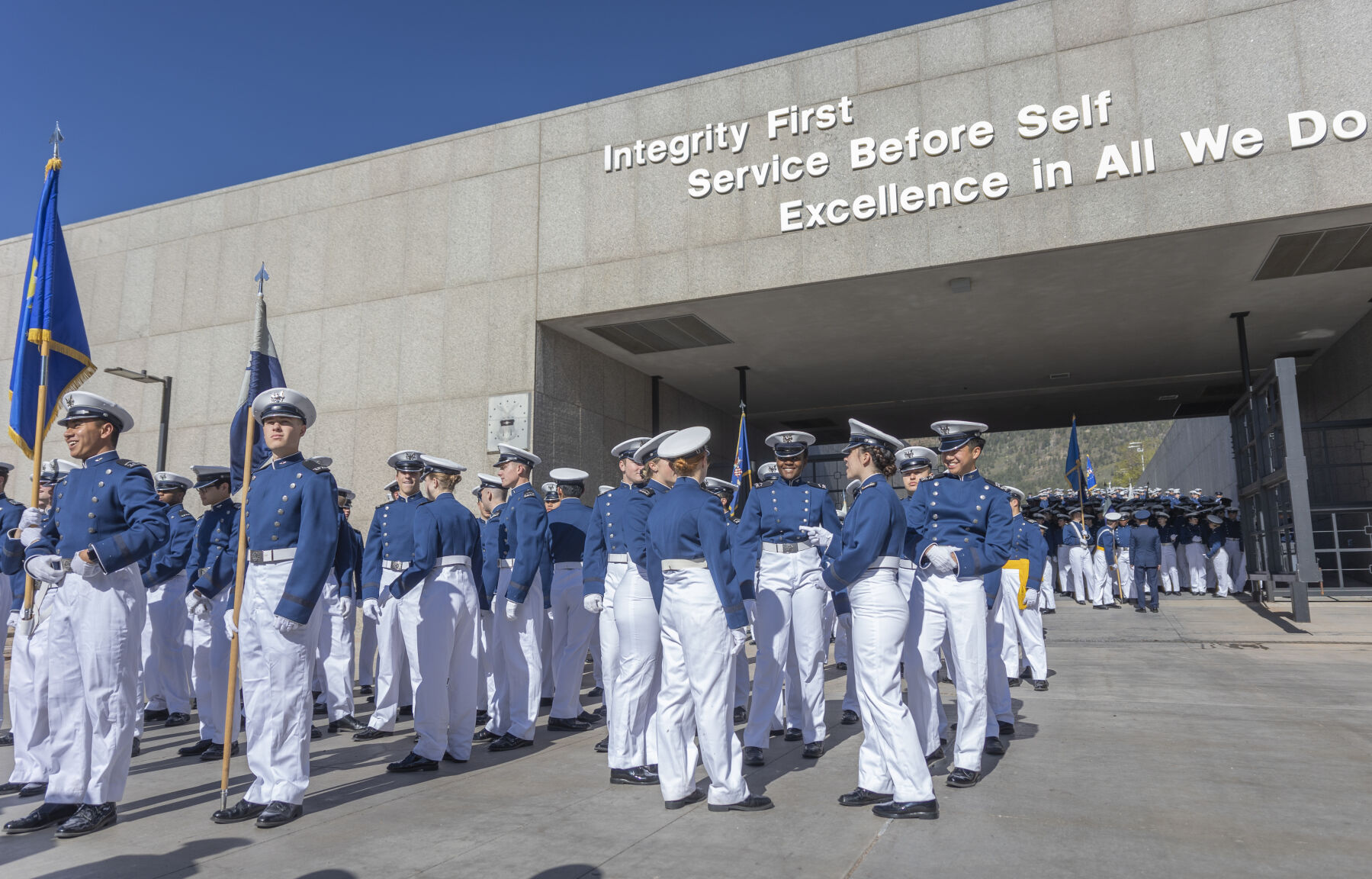 Cadets line up for the U.S. Air Force Academy Class of 2023 Graduation Parade at Stillman Field underneath the core values in Colorado Springs, Co., on Wednesday, May 31, 2023. (Gabi Broekema)