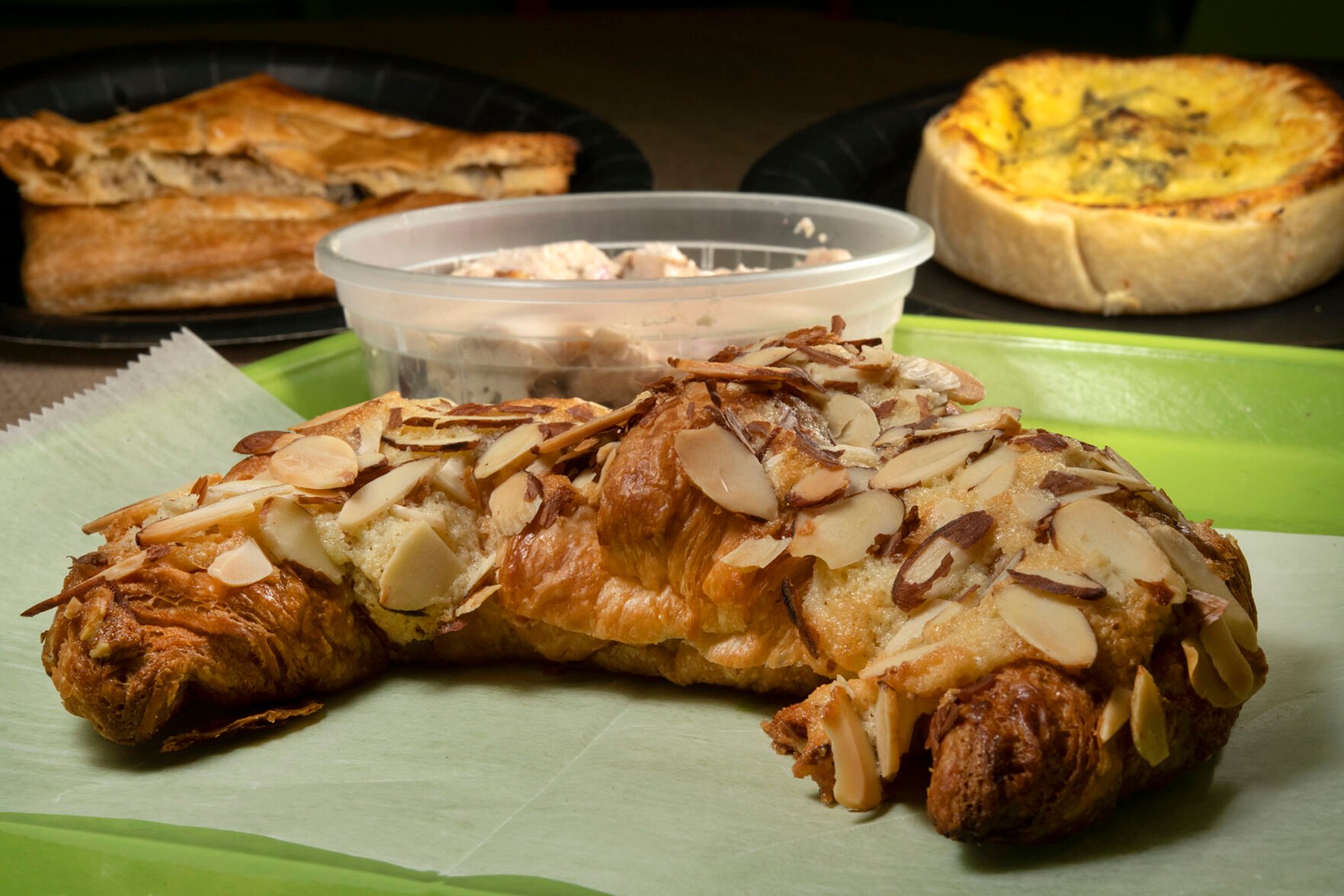 Almond croissant, chicken salad, mushroom friand and green chile quiche at The French Kitchen. (Jeff Kearney, special to the gazette)