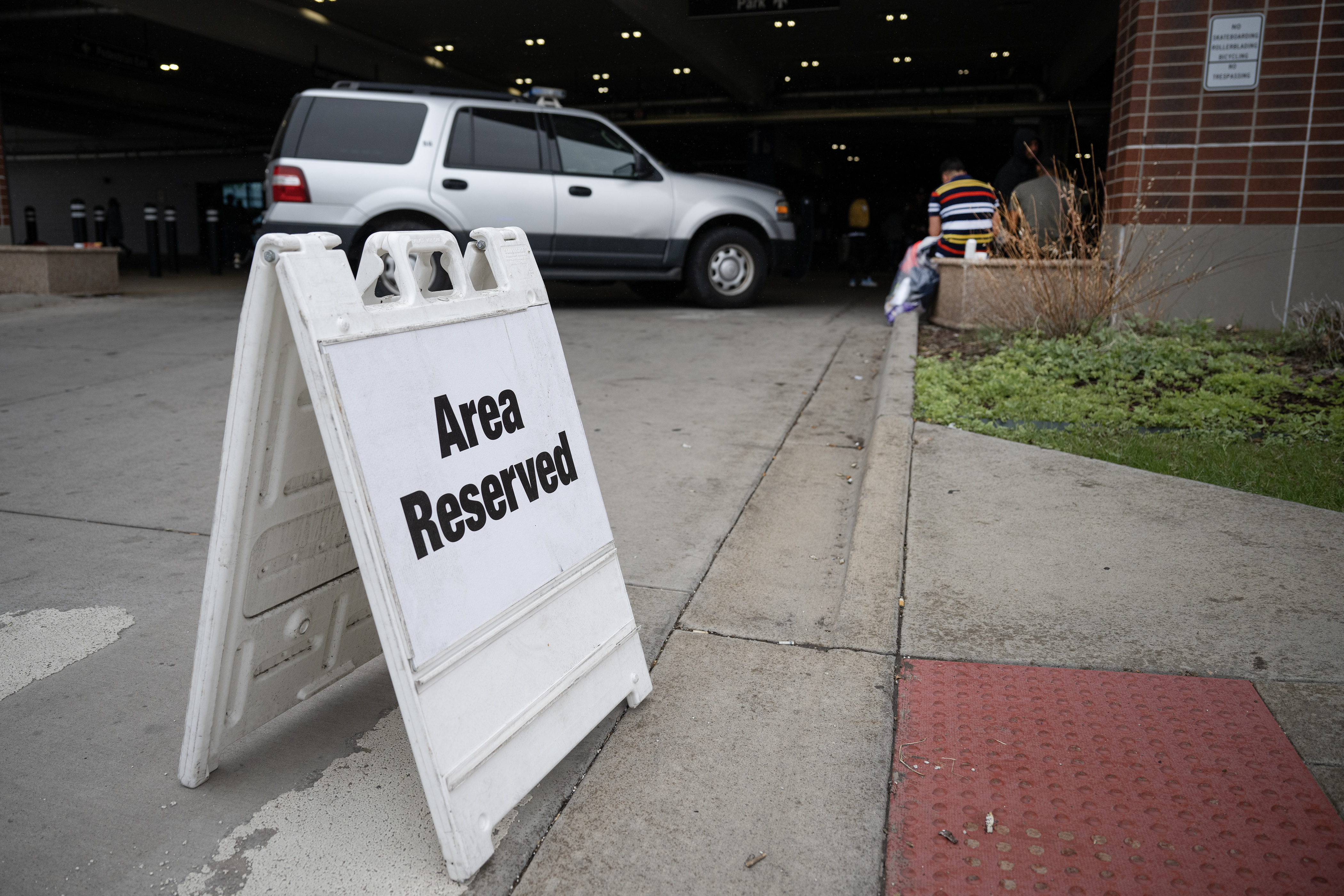 Recently arrived immigrants are provided services in a blocked-off parking garage on Wednesday, May 10, 2023, on the Auraria Campus in Denver. (Timothy Hurst/Denver Gazette) (TimHursttim.hurst@gazette.comhttps://secure.gravatar.com/avatar/aca82bd62b4ee425c598527cd6faa1b1?d=mm&r=g)