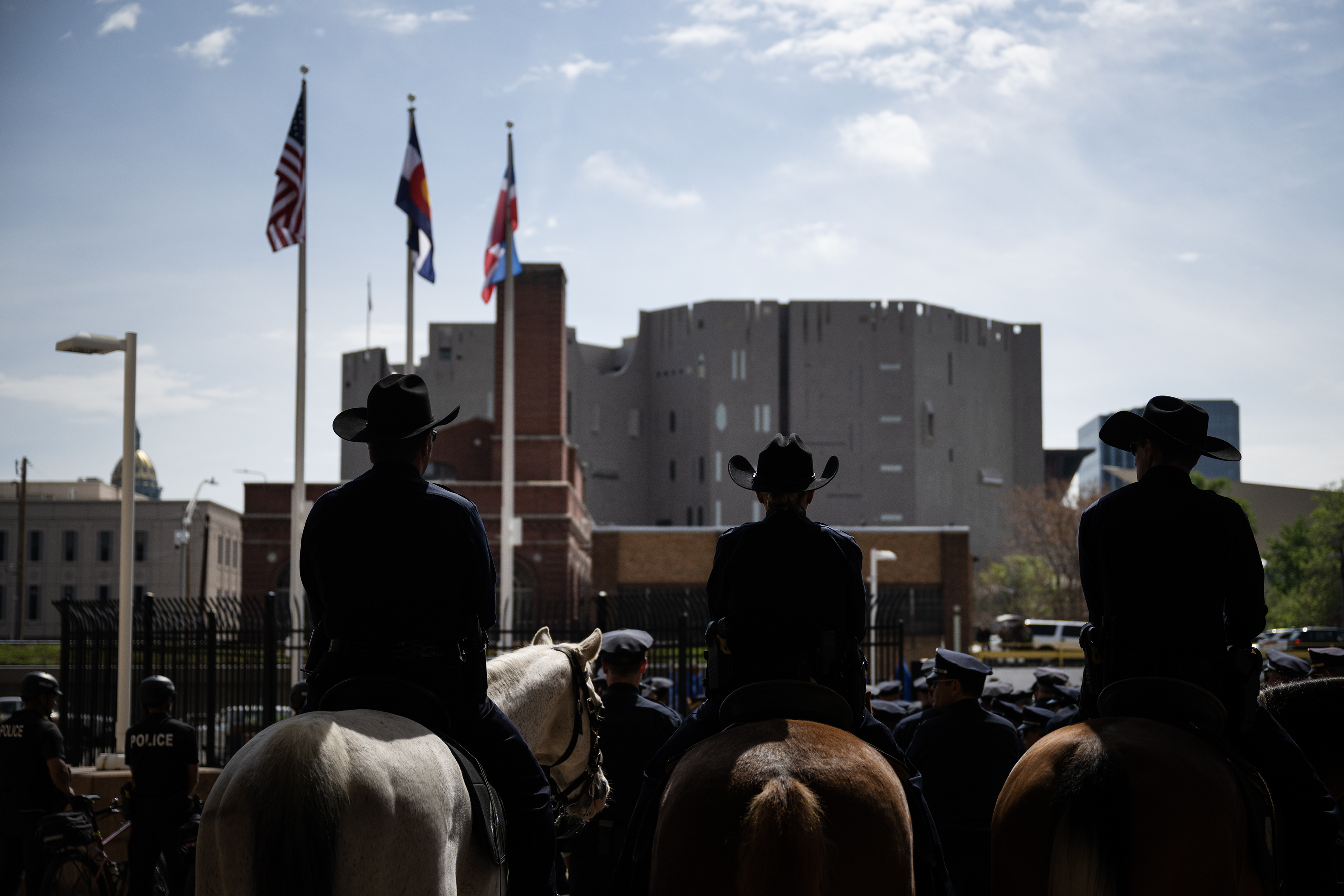 Denver Police Department mounted patrol unit officers look on before the department’s annual fallen officers memorial ceremony on Thursday, May 18, 2023, at DPD’s administration building in Denver, Colo. (Timothy Hurst/Denver Gazette) (TimHursttim.hurst@gazette.comhttps://secure.gravatar.com/avatar/aca82bd62b4ee425c598527cd6faa1b1?d=mm&r=g)