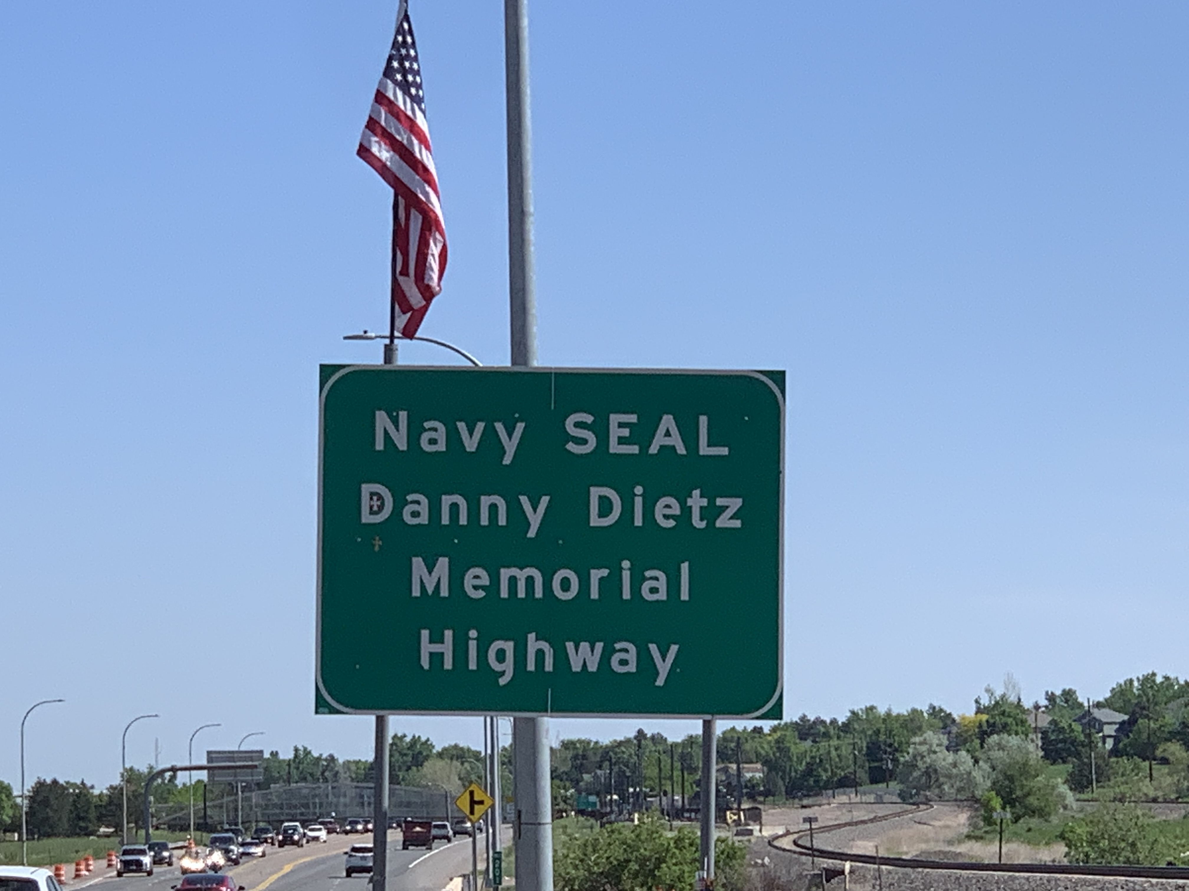Someone erected a U.S. flag on the sign marking the Navy SEAL Danny Dietz Memorial Highway Memorial Day, Monday, May 29, 2023. The sign is on northbound Santa Fe Boulevard, just south of Mineral Road. (DennisHuspeniCity Editordennis.huspeni@gazette.comhttps://denvergazette.com/content/tncms/avatars/c/5a/fbd/c5afbd32-5030-11eb-bdef-030d9de52a9e.779683cee495ffe64766291c251a8894.png)