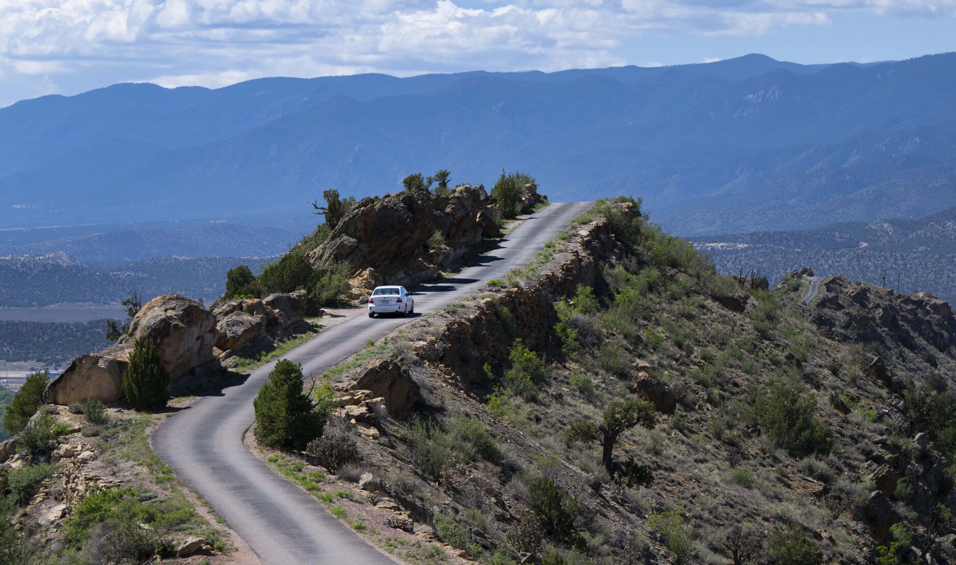 A car drives along the narrow Skyline Drive near Cañon City Tuesday, May 16, 2023. The narrow road 500 feet above U.S. Highway 50 was built in 1905 by prisoners at the Territorial Prison in town. (The Gazette, Christian Murdock) (Christian Murdock/The Gazette)