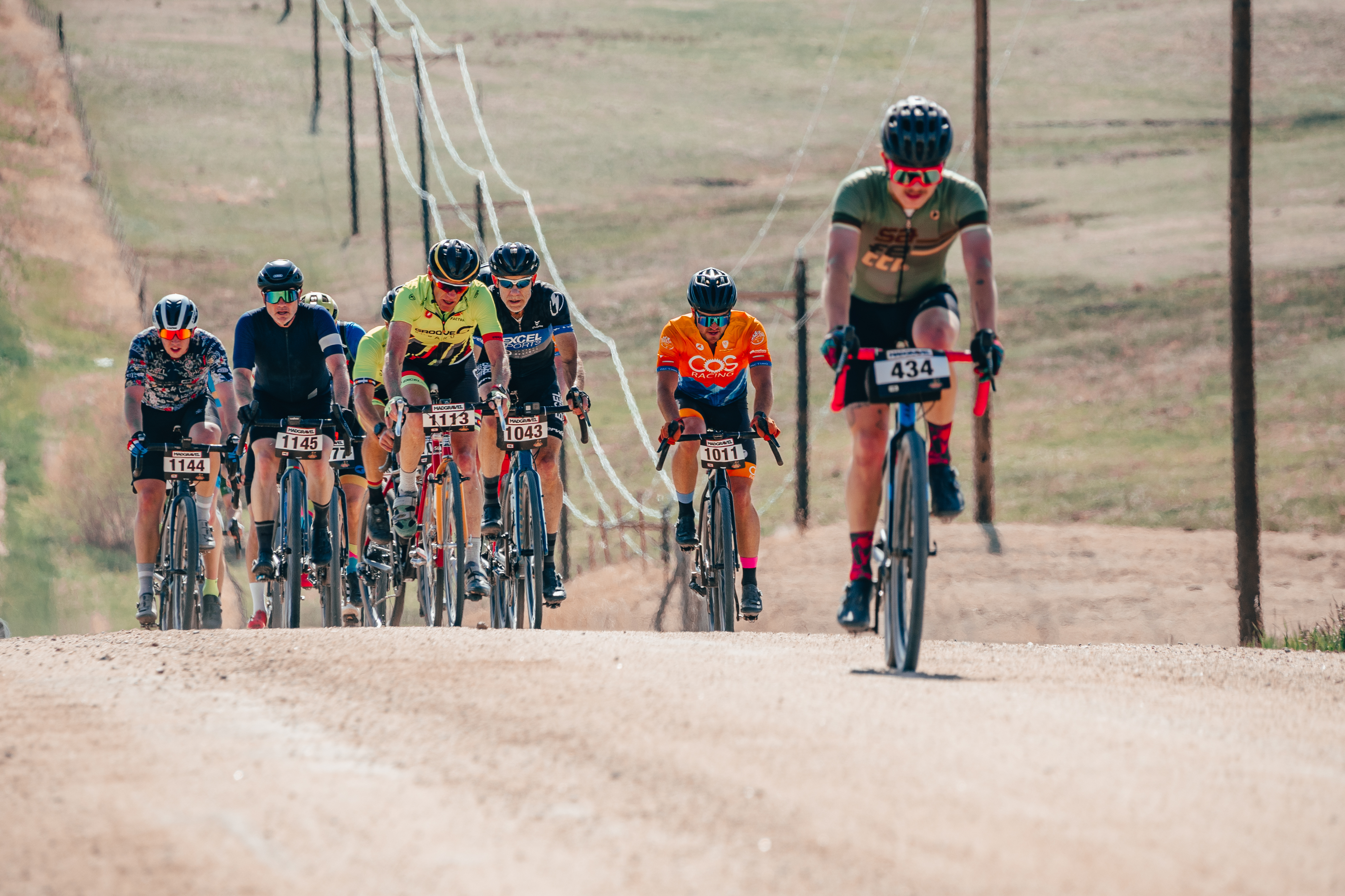 Gravel bikes rider ascends a dirt road during a Mad Gravel race in Elbert, County in May 2022. (Courtesy, BeFeral Media)