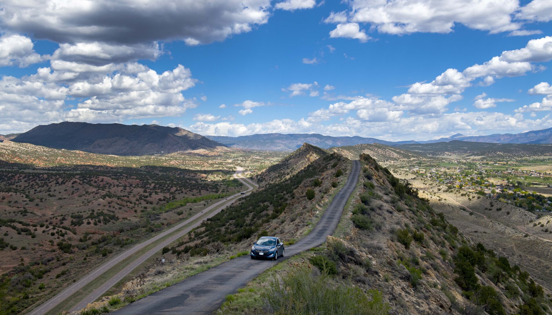A car drives along the narrow, 2.6-mile Skyline Drive about 500 feet above U.S. 50 last week near Cañon City. (Photos by Christian Murdock, The Gazette)