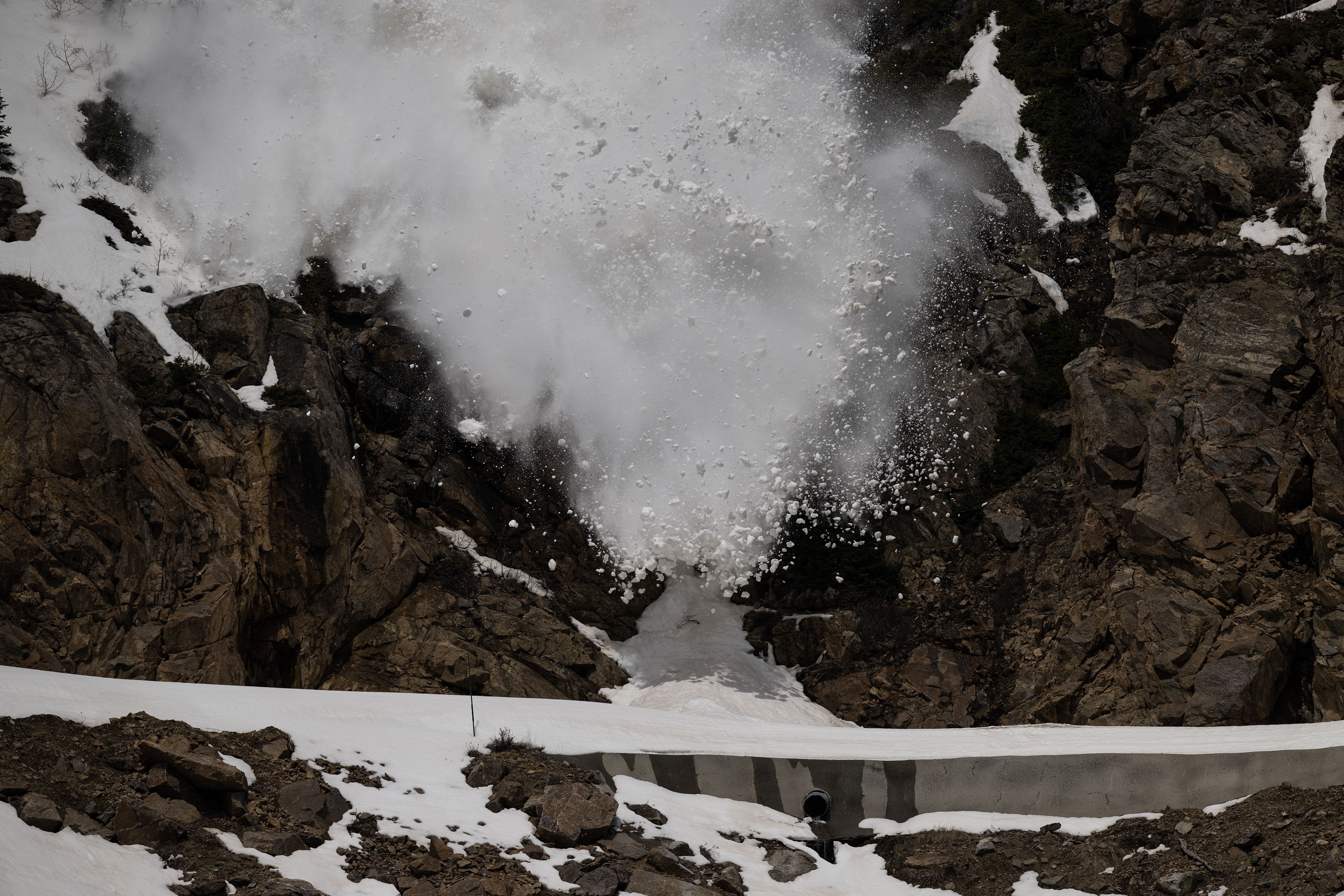 A manmade avalanche crashes down onto Colorado 82 on the east side of Independence Pass as Colorado Department of Transportation and Colorado Avalanche Information Center crews for perform avalanche mitigation work in anticipation for clearing and open the highway later this month, as seen on Tuesday, May 2, 2023, in Lake County, Colo. (Timothy Hurst/Denver Gazette) (TimHursttim.hurst@gazette.comhttps://secure.gravatar.com/avatar/aca82bd62b4ee425c598527cd6faa1b1?d=mm&r=g)