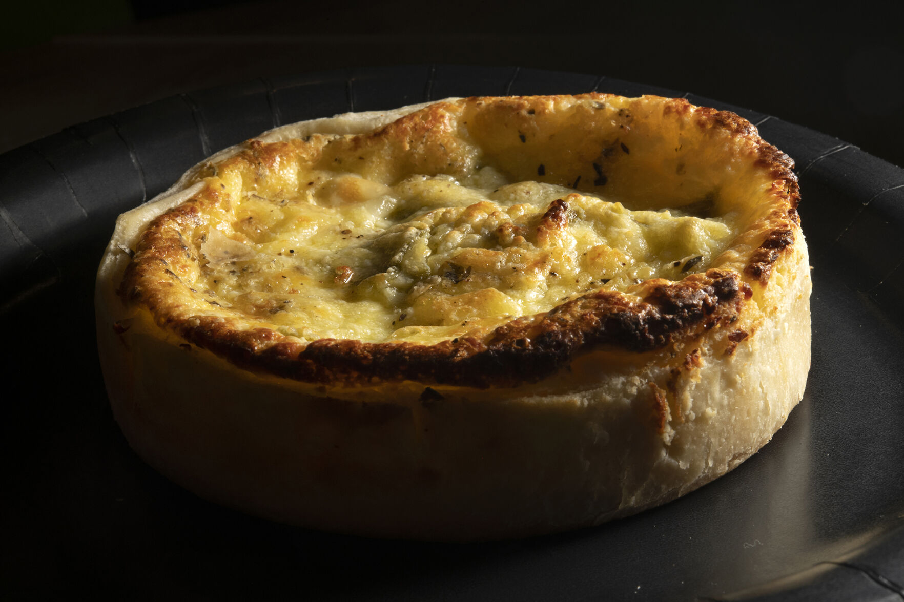 Right: Green chile quiche at The French Kitchen is one of three types of quiche offered. (Jeff Kearney, special to the gazette)