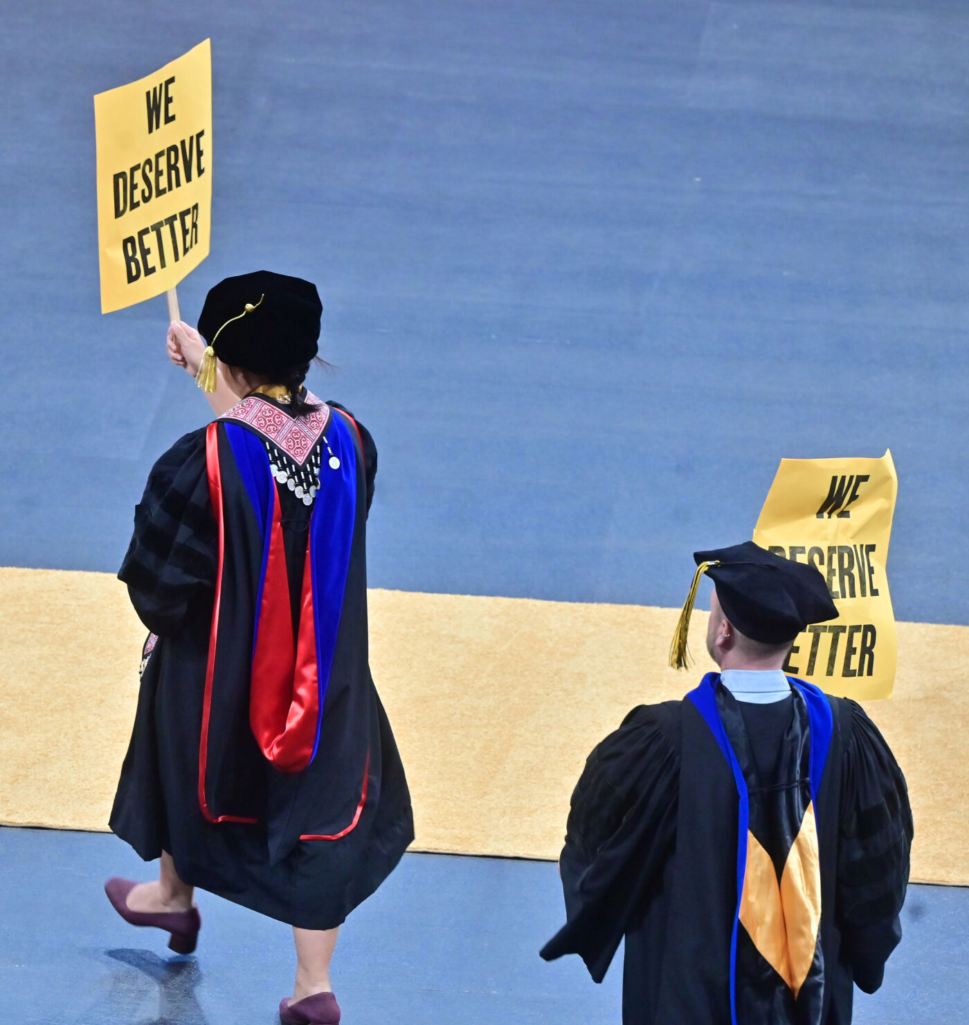 Academics of Colorado College walk out in protest during the commencement speech of Former U.S. Rep. Liz Cheney, R-Wyo., at Colorado College on Sunday, May 28, 2023. (Photo by Jerilee Bennett, The Gazette)