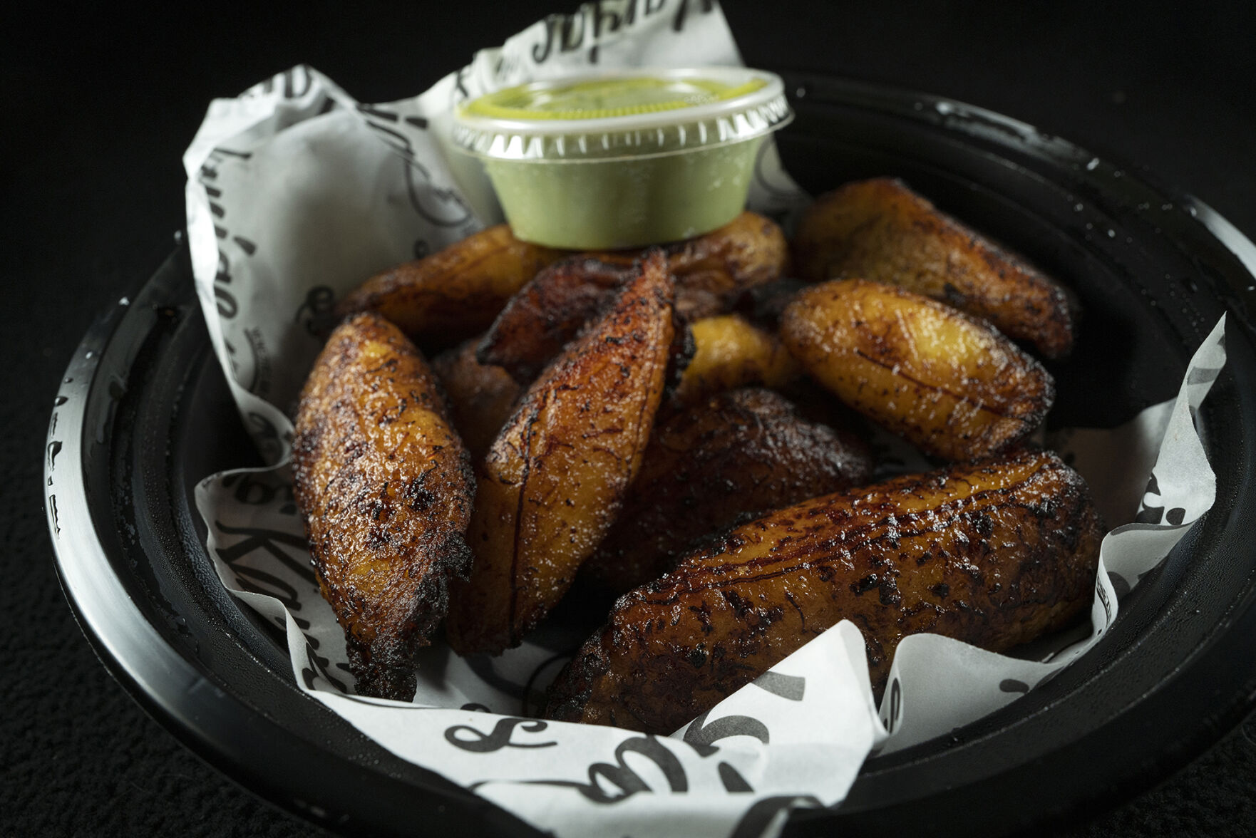 Kariacos Restaurant (Located at: 1169 N. Circle Dr.) “Fried Sweet Plantains To-Go” Tuesday April 25, 2023. Photo by Jeff Kearney. (Jeff Kearney)