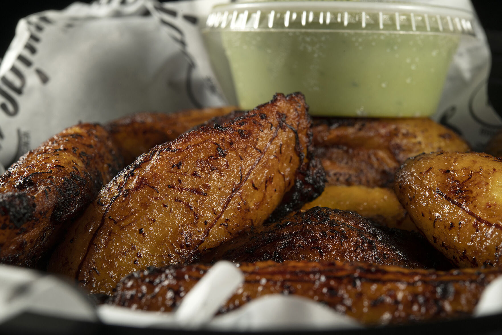 Kariacos Restaurant (Located at: 1169 N. Circle Dr.) “Fried Sweet Plantains To-Go” Tuesday April 25, 2023. Photo by Jeff Kearney. (Jeff Kearney)