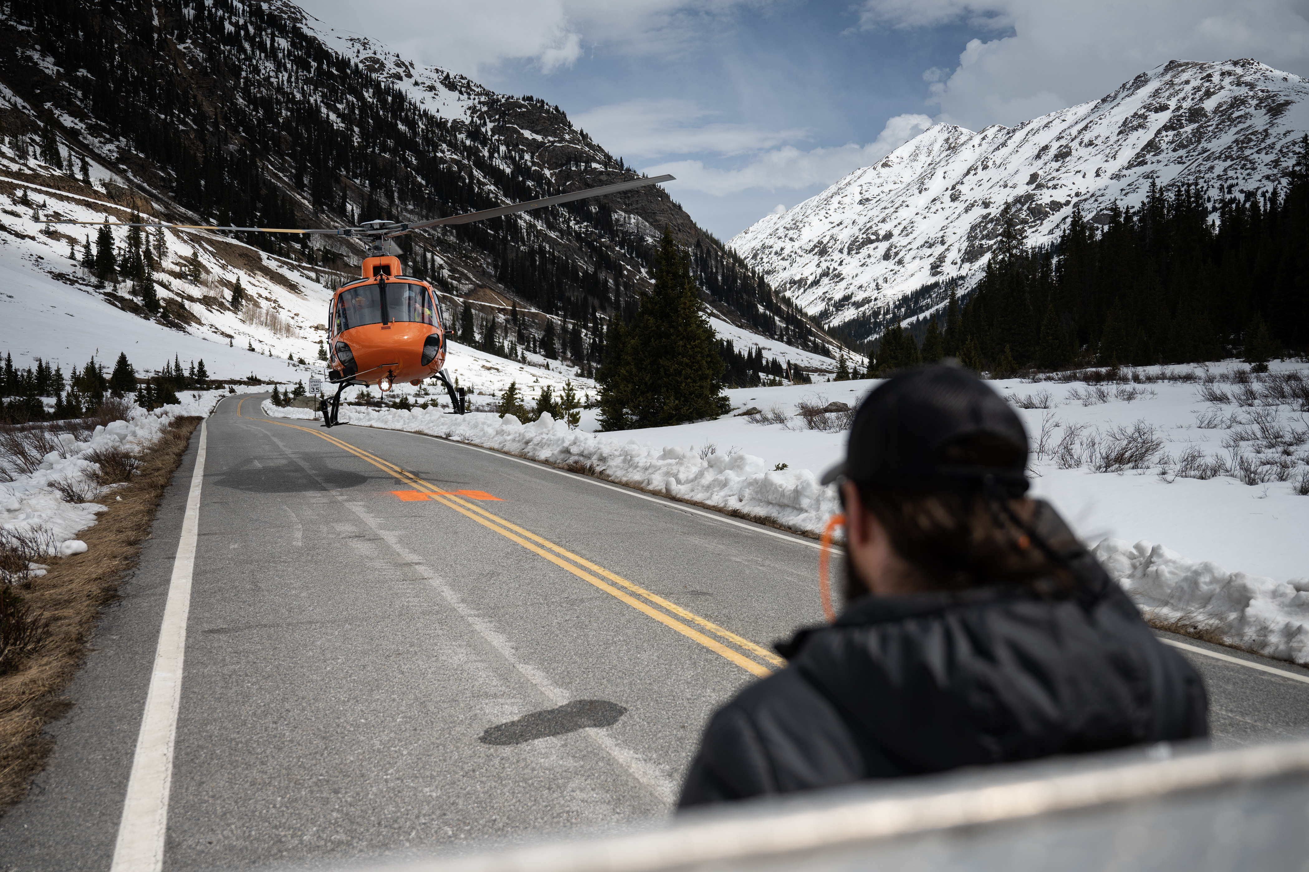 The helicopter being used for avalanche mitigation work takes off from Colorado 82 before it heads to the saddle of the mountain to blast the overhanging snow slab and trigger an avalanche on the east side of Independence Pass on Tuesday, May 2, 2023, in Lake County, Colo. (Timothy Hurst/Denver Gazette) (TimHursttim.hurst@gazette.comhttps://secure.gravatar.com/avatar/aca82bd62b4ee425c598527cd6faa1b1?d=mm&r=g)