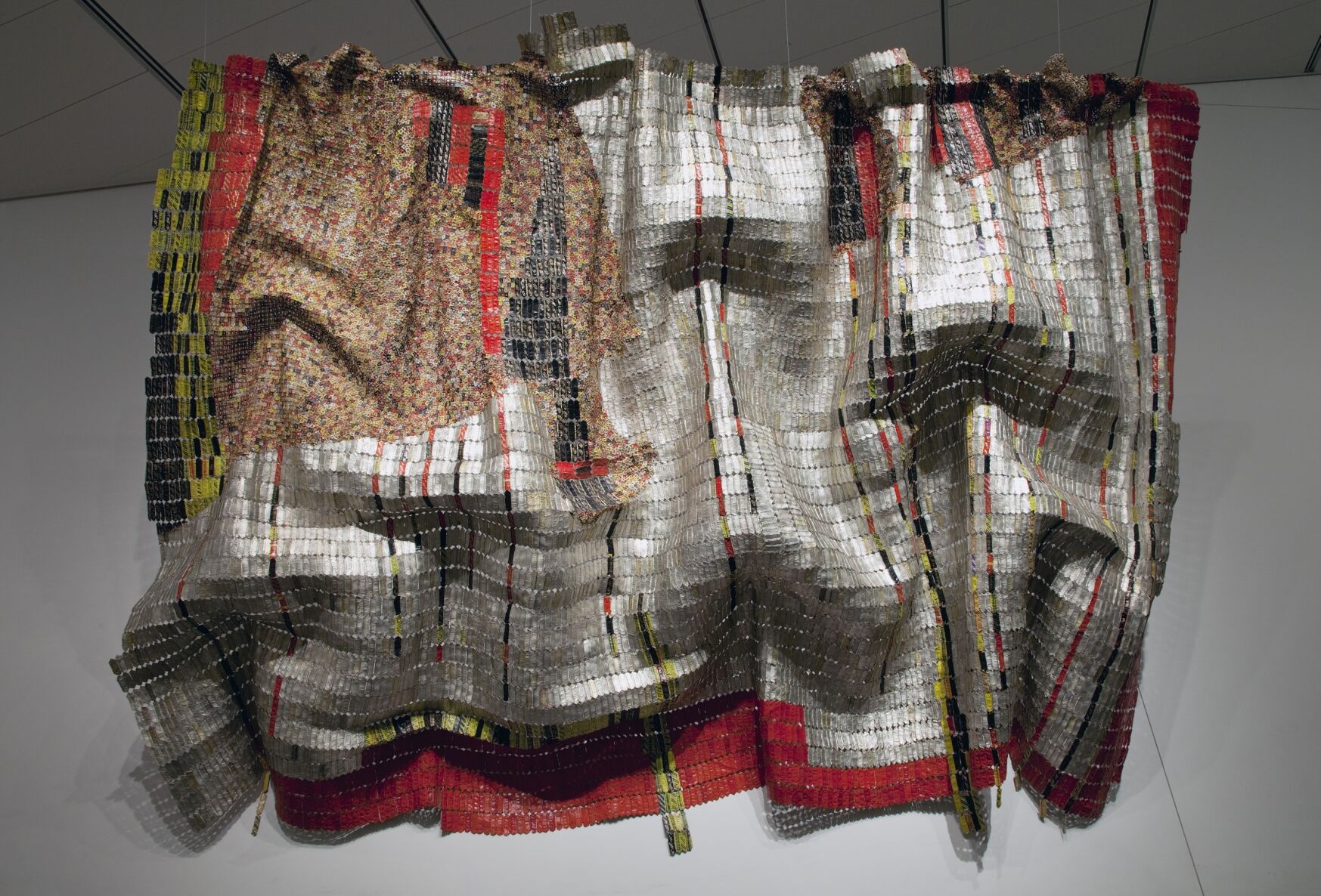 “Rain Has No Father?” by El Anatsui, 2008. Found bottle tops and copper wire. The Denver Art Museum is set to unveil three reinstalled collections this Sunday in its Hamilton Building, including this piece seen in the Arts of Africa Collection. (Courtesy of the Denver Art Museum)