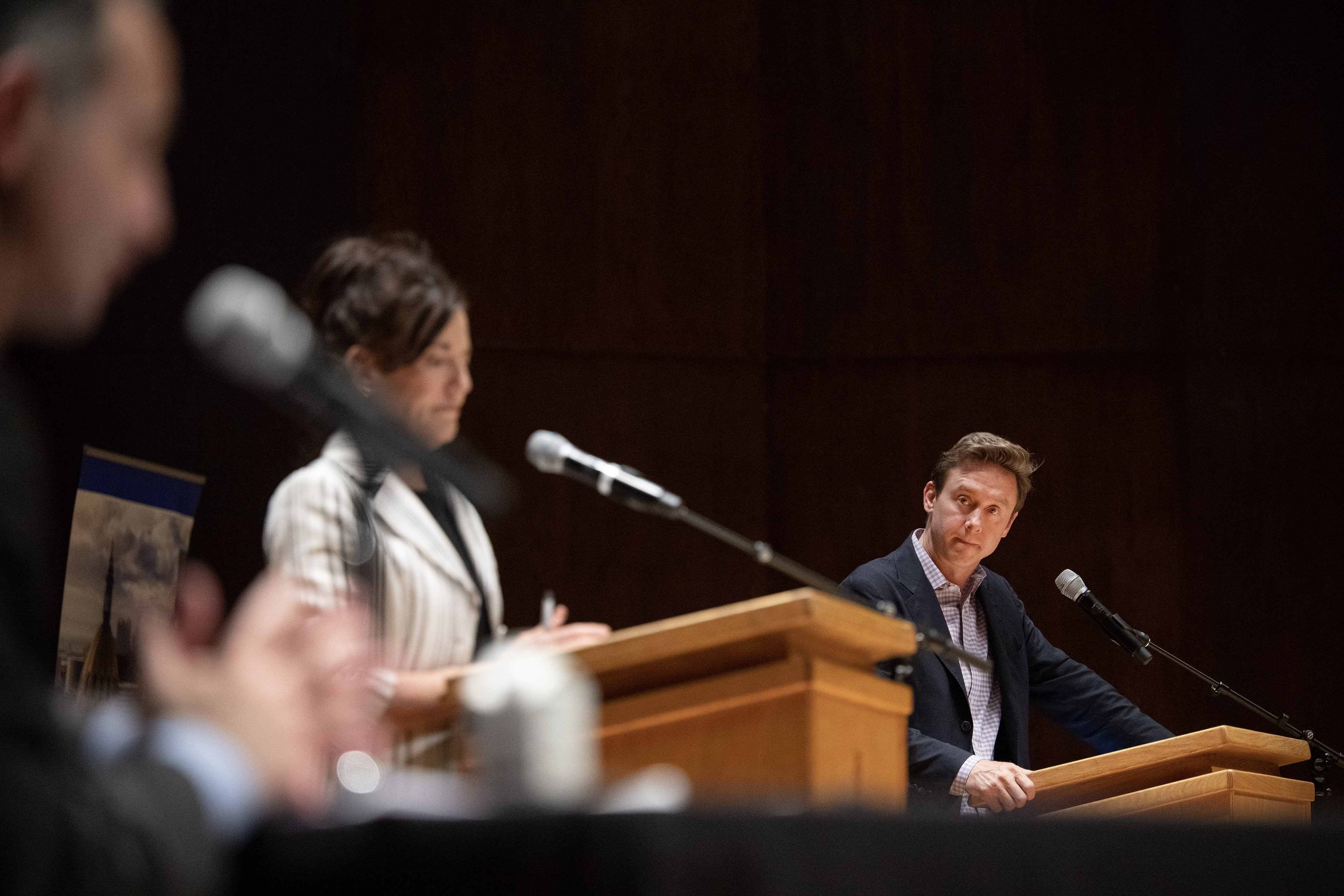 Denver mayoral run-off candidate Mike Johnston, right, looks on while being asked a question during a debate with candidate Kelly Brough on Thursday, May 18, 2023, in the Sam & Freda Davis Auditorium at the University of Denver in Denver, Colo. (Timothy Hurst/Denver Gazette) (TimHursttim.hurst@gazette.comhttps://secure.gravatar.com/avatar/aca82bd62b4ee425c598527cd6faa1b1?d=mm&r=g)