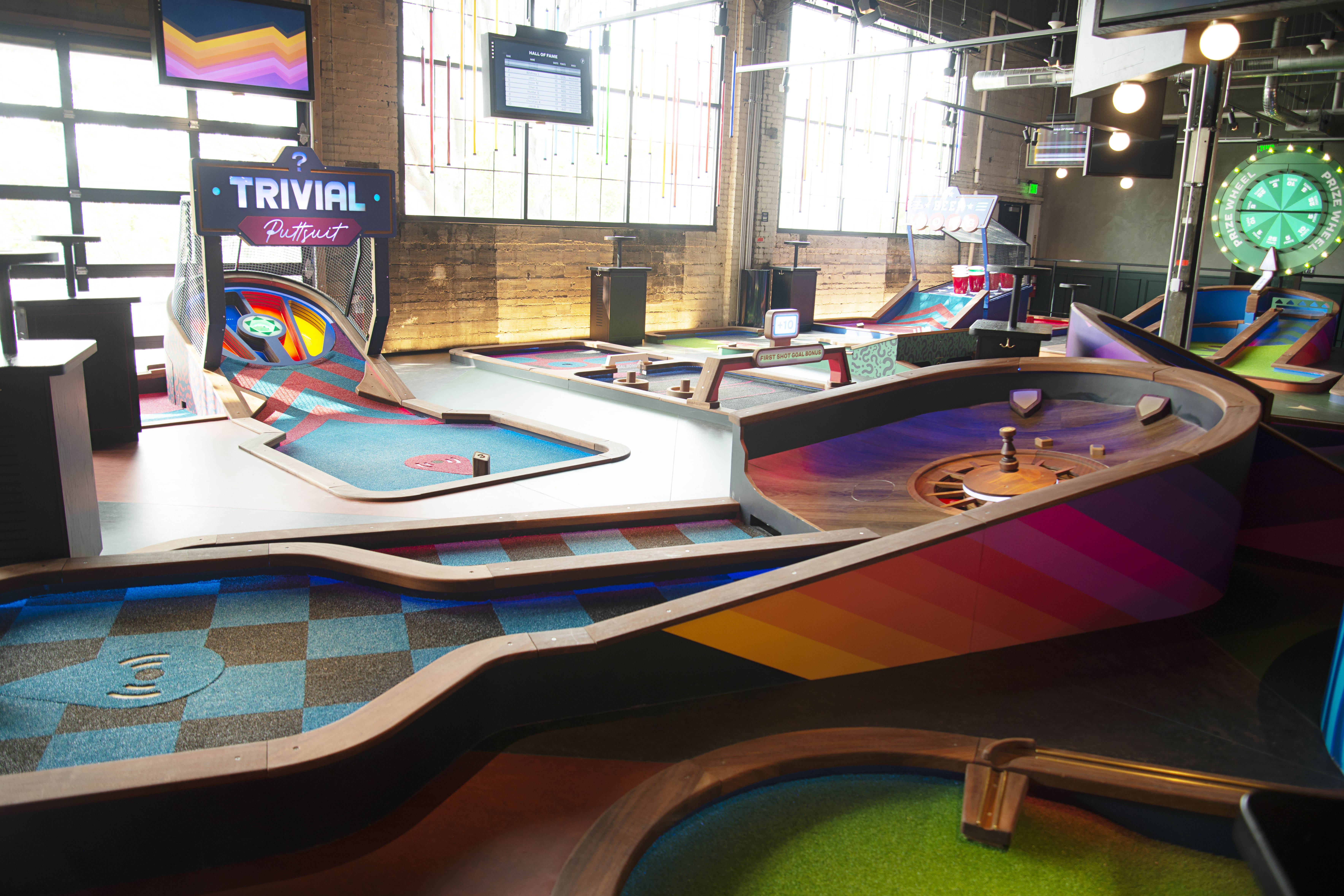 High-tech mini golf and bar concept Puttshack opens in RiNo Friday