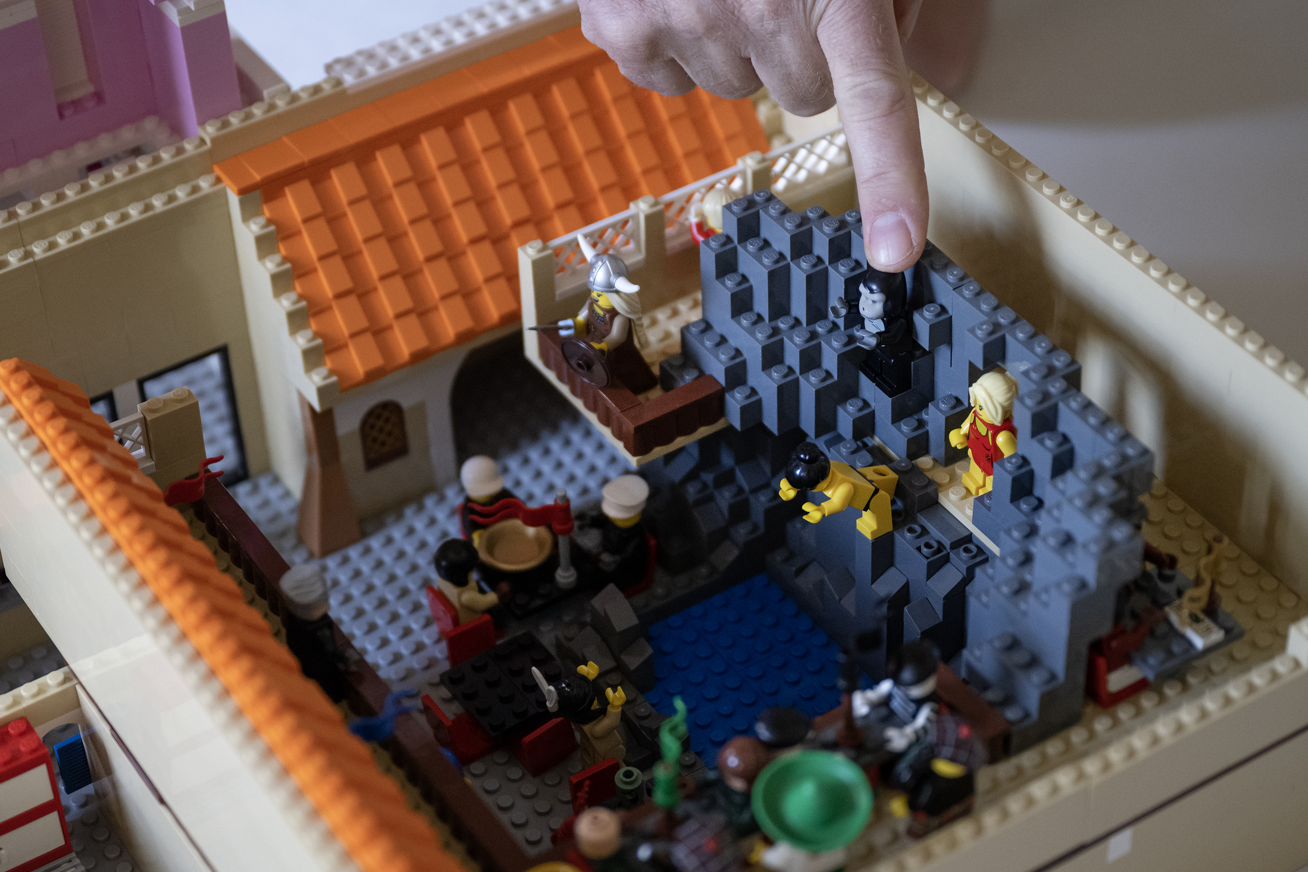 Art Rodgers, who built the Lego display of Casa Bonita that was on display at History Colorado last summer, points out the gorilla and cliff divers that are among the details of the display on Monday, May 8, 2023, at Rodgers’ home in Longmont, Colo. (Timothy Hurst/Denver Gazette) (TimHursttim.hurst@gazette.comhttps://secure.gravatar.com/avatar/aca82bd62b4ee425c598527cd6faa1b1?d=mm&r=g)