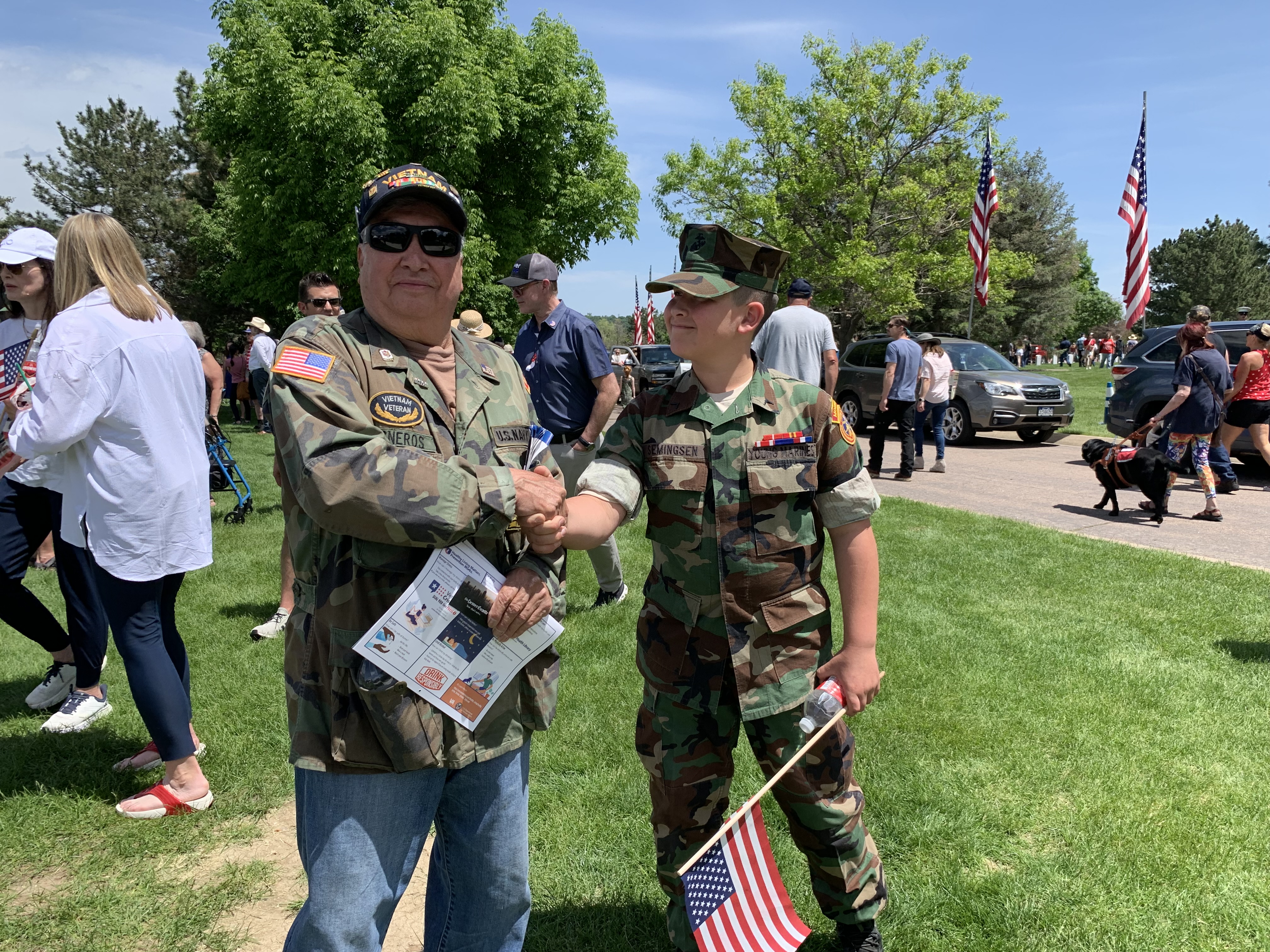 Gilbert Sisneros, 75, shakes the hand of 10-year-old Hunter Semingsen of the Mountain View Young Marines at the 89th Anniversary of Remembrance at Fort Logan National Cemetery Monday, May 29, 2023. Semingsen thanks Sisneros, a Vietnam veteran, for his service. (DennisHuspeniCity Editordennis.huspeni@gazette.comhttps://denvergazette.com/content/tncms/avatars/c/5a/fbd/c5afbd32-5030-11eb-bdef-030d9de52a9e.779683cee495ffe64766291c251a8894.png)