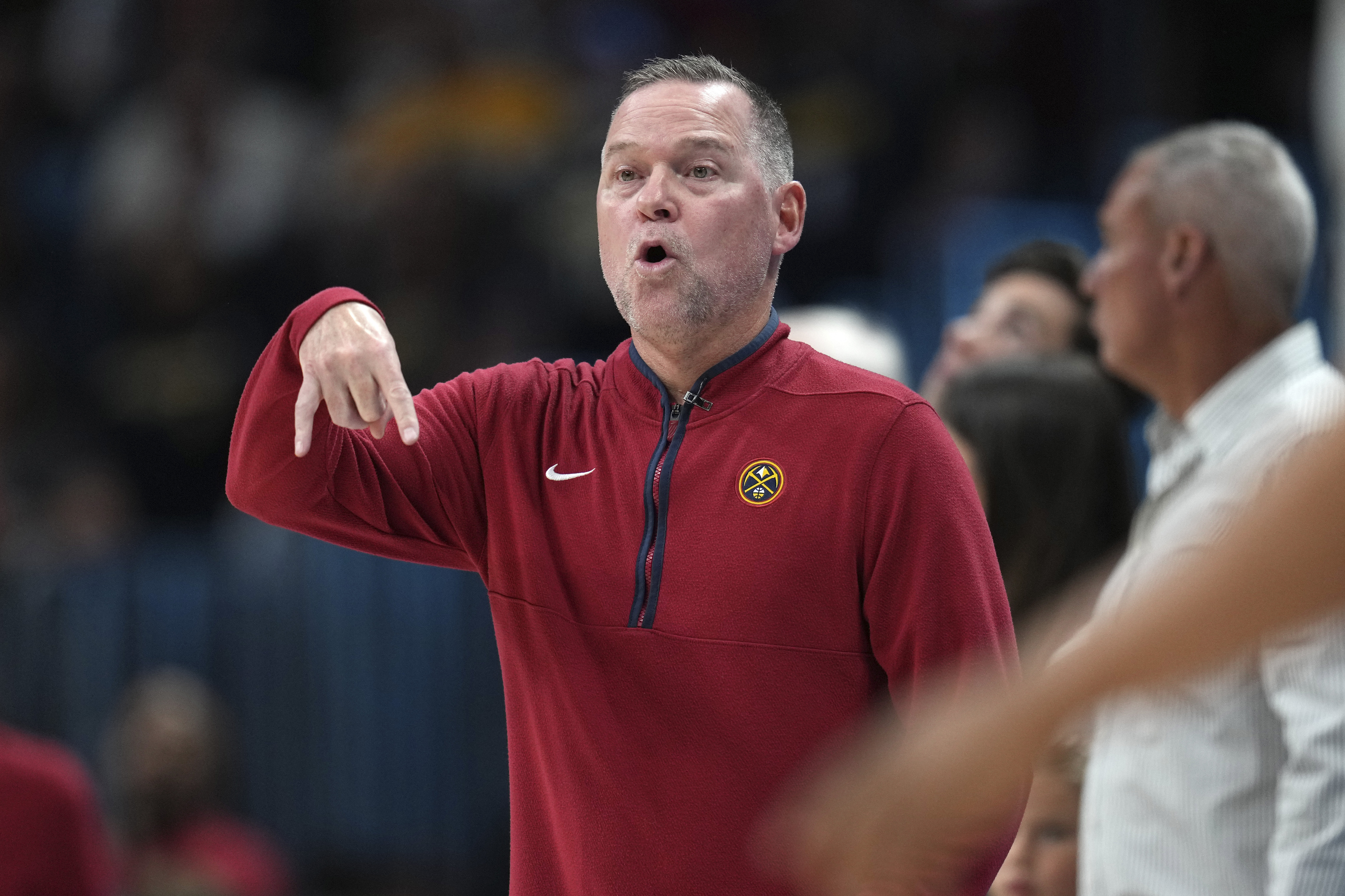 Denver Nuggets head coach Michael Malone motions during the first half of Game 2 of the NBA basketball Western Conference Finals series against the Los Angeles Lakers, Thursday, May 18, 2023, in Denver. (AP Photo/Jack Dempsey) (Jack Dempsey)