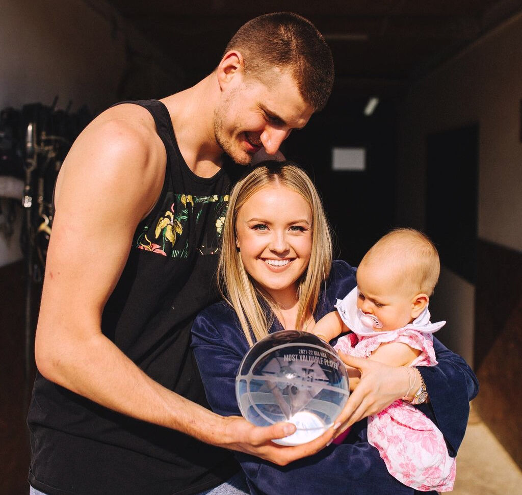 Denver Nuggets Nikola Jokic with his wife, Natalija and daughter, Ognjena, in a May 27th, 2022 photo holding the 2021-22 NBA Most Valuable Player trophy in this photo posted to Instagram by Natalija Jokic. (Natalija Jokic via Instagram)