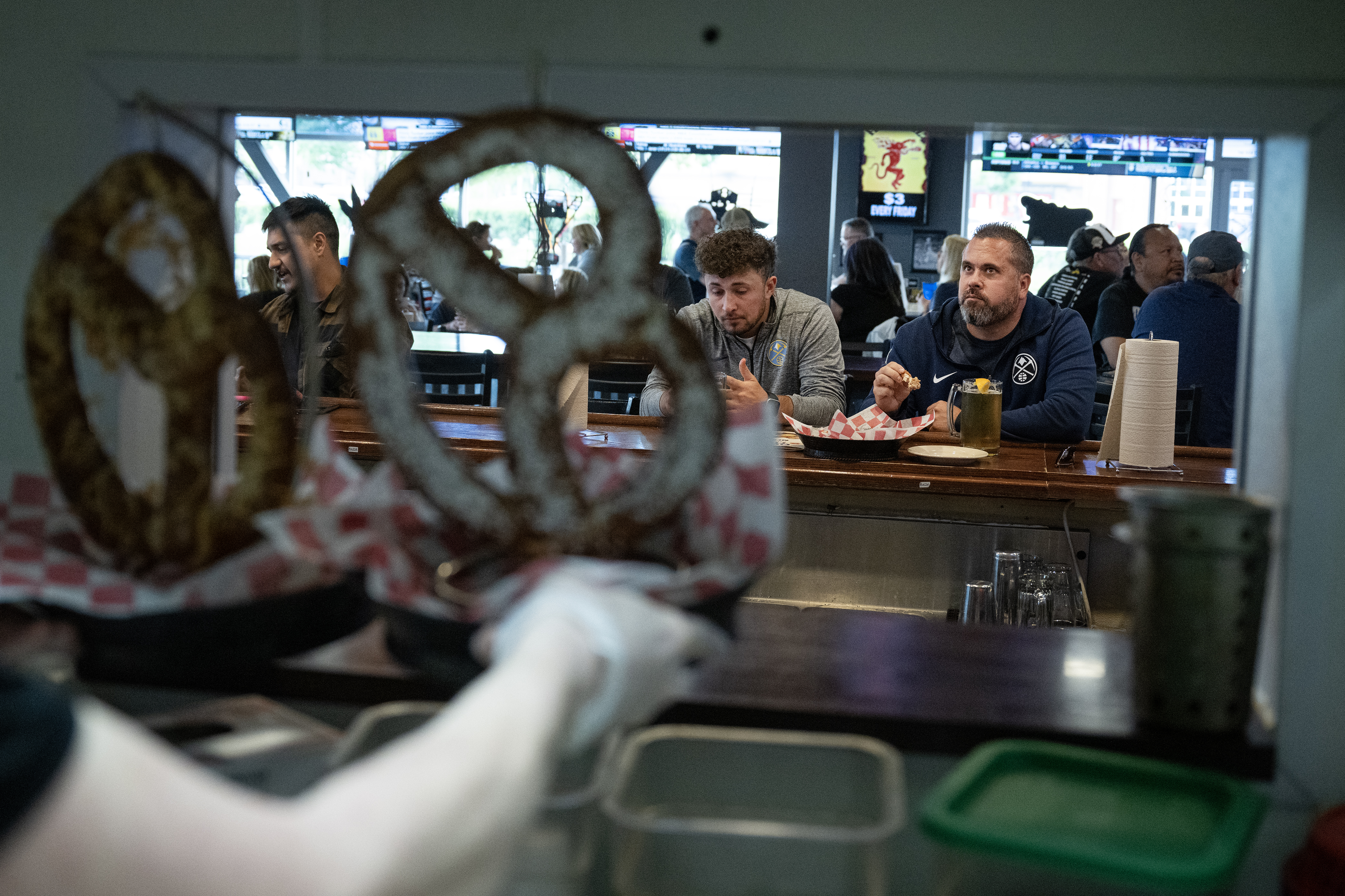 Nuggets fans eat and drink at the bar before the Denver Nuggets fourth NBA Finals game against the Miami Heat, on Friday, June 9, 2023, at ‘Bout Time Pub & Grub in Sheridan, Colo. (Timothy Hurst/Denver Gazette) (TimHursttim.hurst@gazette.comhttps://secure.gravatar.com/avatar/aca82bd62b4ee425c598527cd6faa1b1?d=mm&r=g)