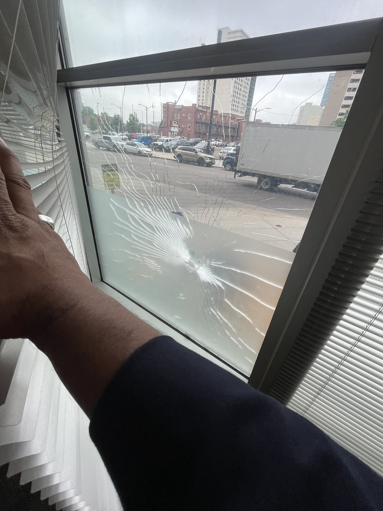 The Denver Clerk and Recorder's office was collateral damage in a gunfight which broke out nearby in the parking lot at 15th and Court Place near downtown Denver. Police said the shooting was unrelated to Nuggets celebrations. (Courtesy of Paul Lopez)