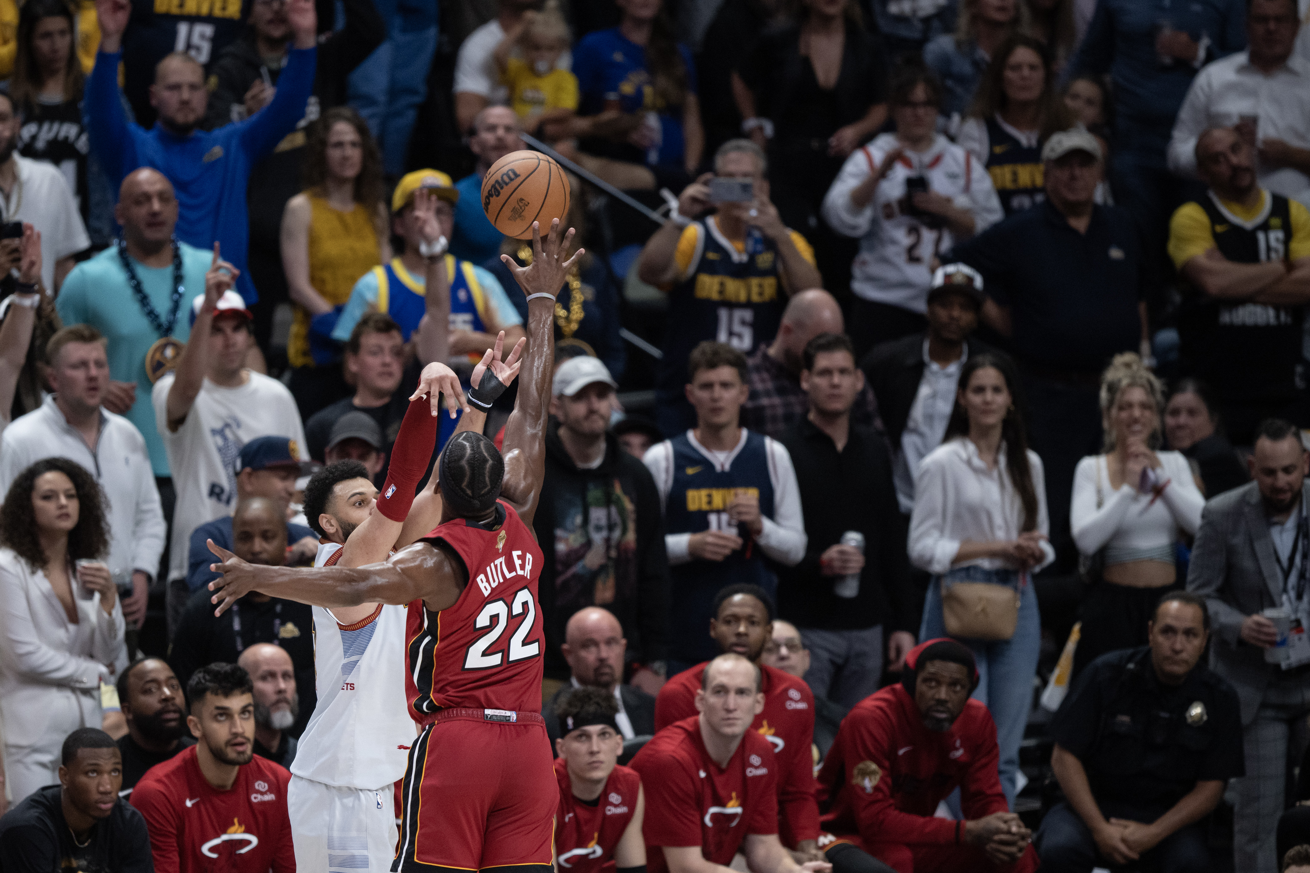 Denver Nuggets guard Jamal Murray (27) hits a three over Miami Heat forward Jimmy Butler (22) during Game 5 of the NBA Finals on Monday, June 12, 2023, at Ball Arena in Denver. (Timothy Hurst/Denver Gazette) (TimHursttim.hurst@gazette.comhttps://secure.gravatar.com/avatar/aca82bd62b4ee425c598527cd6faa1b1?d=mm&r=g)
