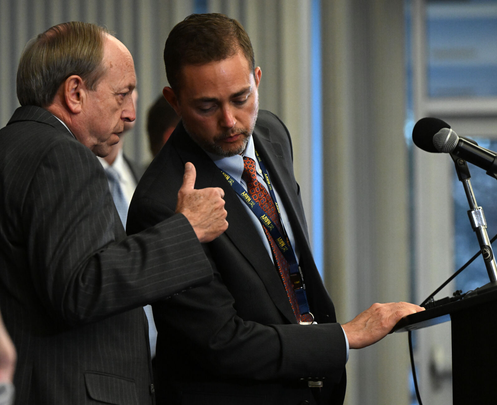 Colorado Springs mayor John Suthers, left, talks to District Attorney Michael Allen during a press conference at the Colorado Police Operation Center Monday, Nov. 21, 2022. Police released the name of the 5 killed in the shooting at the club on Saturday night. (The Gazette, Christian Murdock) (Christian Murdock/The Gazette)