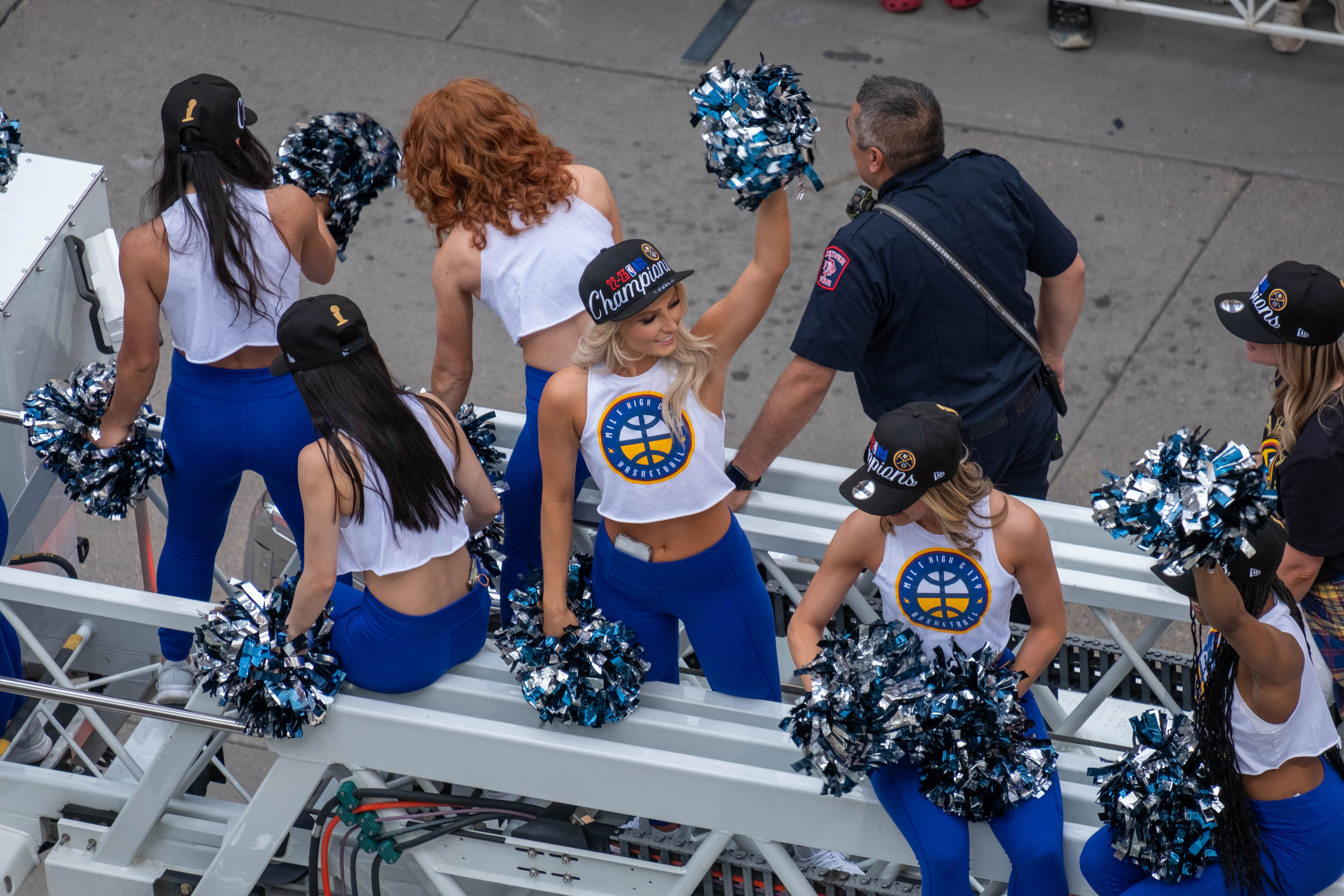 Denver Nuggets cheerleaders wave as they ride atop a Denver Fire Department truck during a parade Thursday morning, June 15, 2023 through downtown Denver to celebrate the NBA franchise’s first league championship. (JonathanIngrahamDigital Strategistjonathan.ingraham@denvergazette.comhttps://denvergazette.com/content/tncms/avatars/c/dd/7f0/cdd7f086-b693-11ec-b373-bba598953eb6.fc0f5608a6f1144f64f080f771bd904d.png)