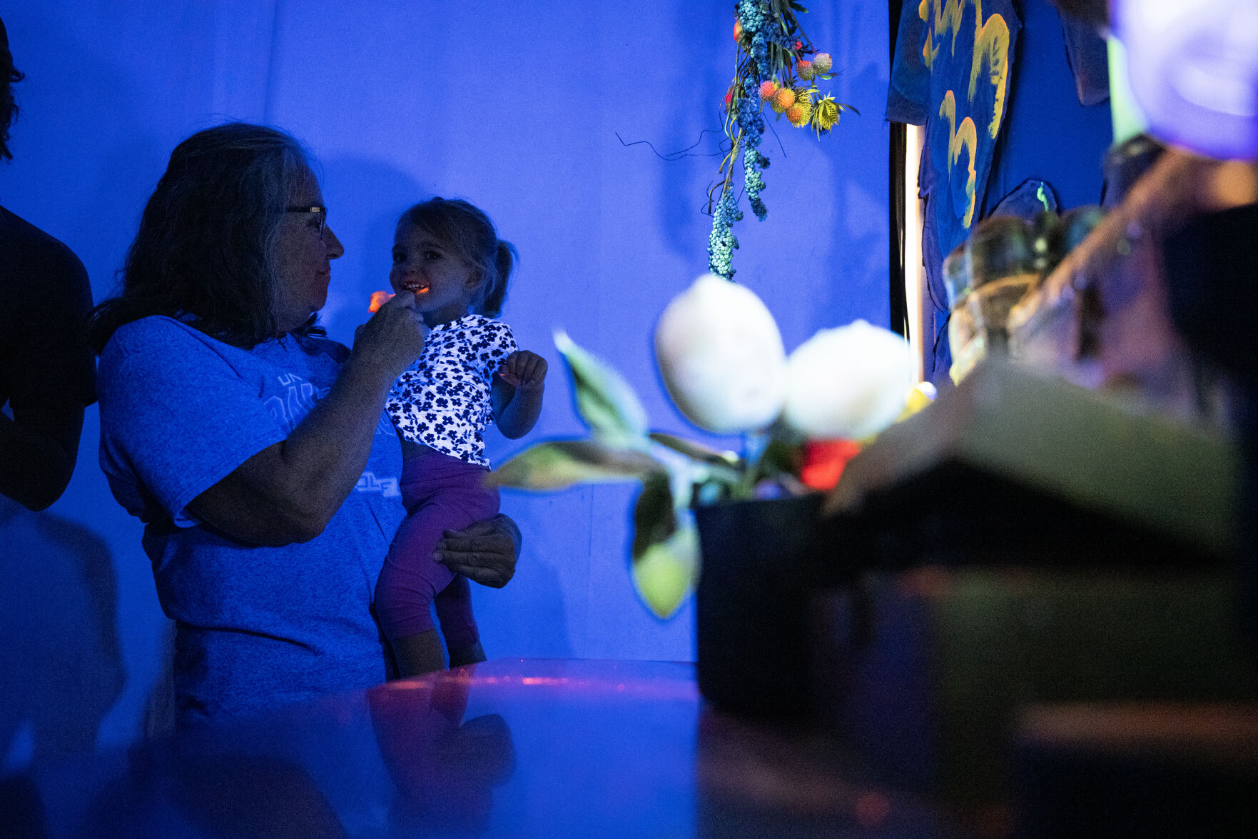 Stella Palmer and her great-grandmother Ann DeStefano sample glow in the dark cotton candy during a demonstration on Friday, June 2, 2023, at The Inventing Room in Denver. (Timothy Hurst/Denver Gazette) (TimHursttim.hurst@gazette.comhttps://secure.gravatar.com/avatar/aca82bd62b4ee425c598527cd6faa1b1?d=mm&r=g)