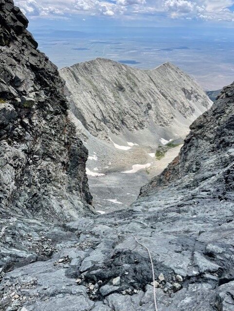 Looking into the steeper section of the Hourglass, where visibility of what lies below is quite limited. Photo Credit: Spencer McKee.