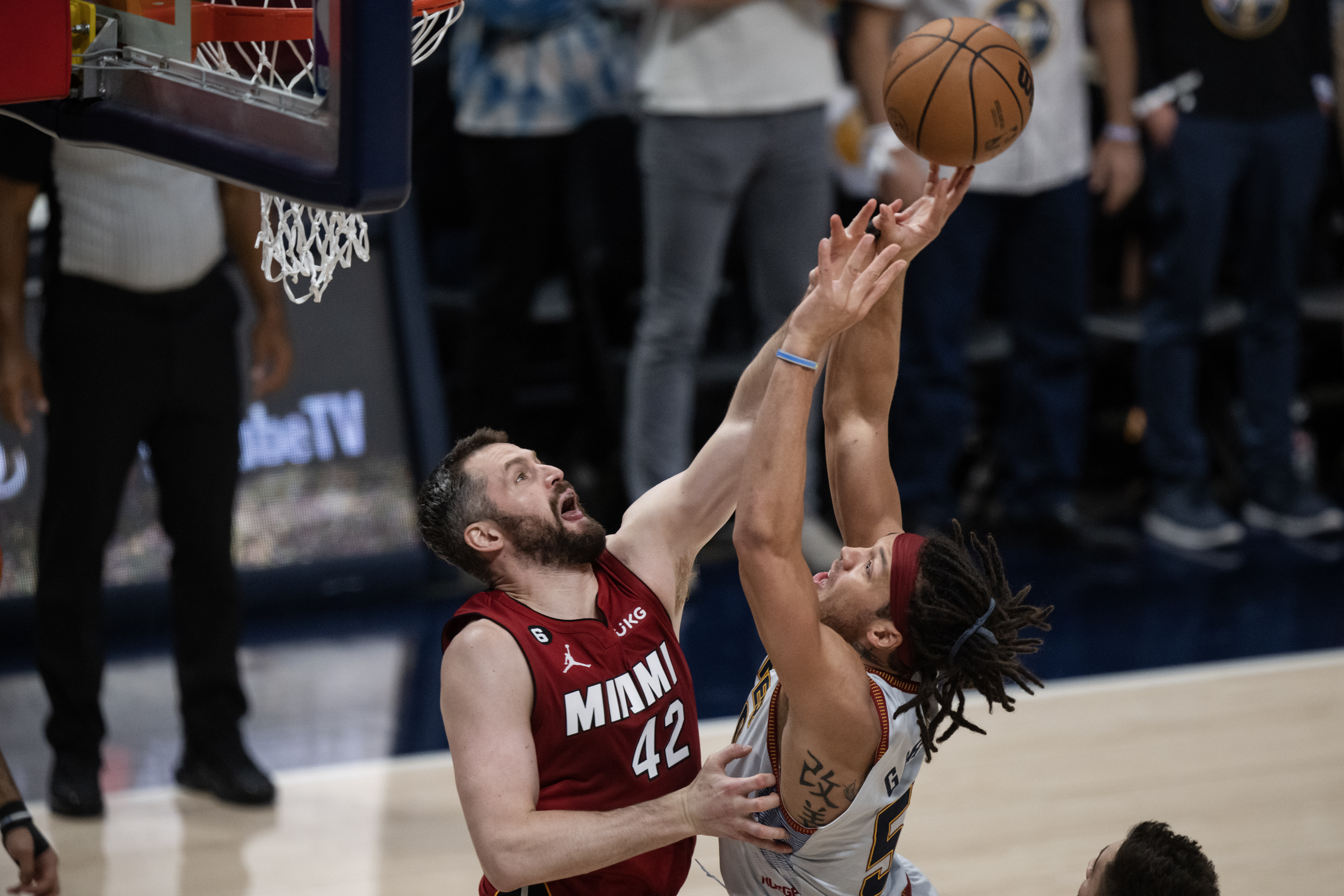 Miami Heat forward Kevin Love (42) blocks a shot by Denver Nuggets forward Aaron Gordon (50) during the first quarter of Game 5 of the NBA Finals on Monday, June 12, 2023, at Ball Arena in Denver. (Timothy Hurst/Denver Gazette) (TimHursttim.hurst@gazette.comhttps://secure.gravatar.com/avatar/aca82bd62b4ee425c598527cd6faa1b1?d=mm&r=g)