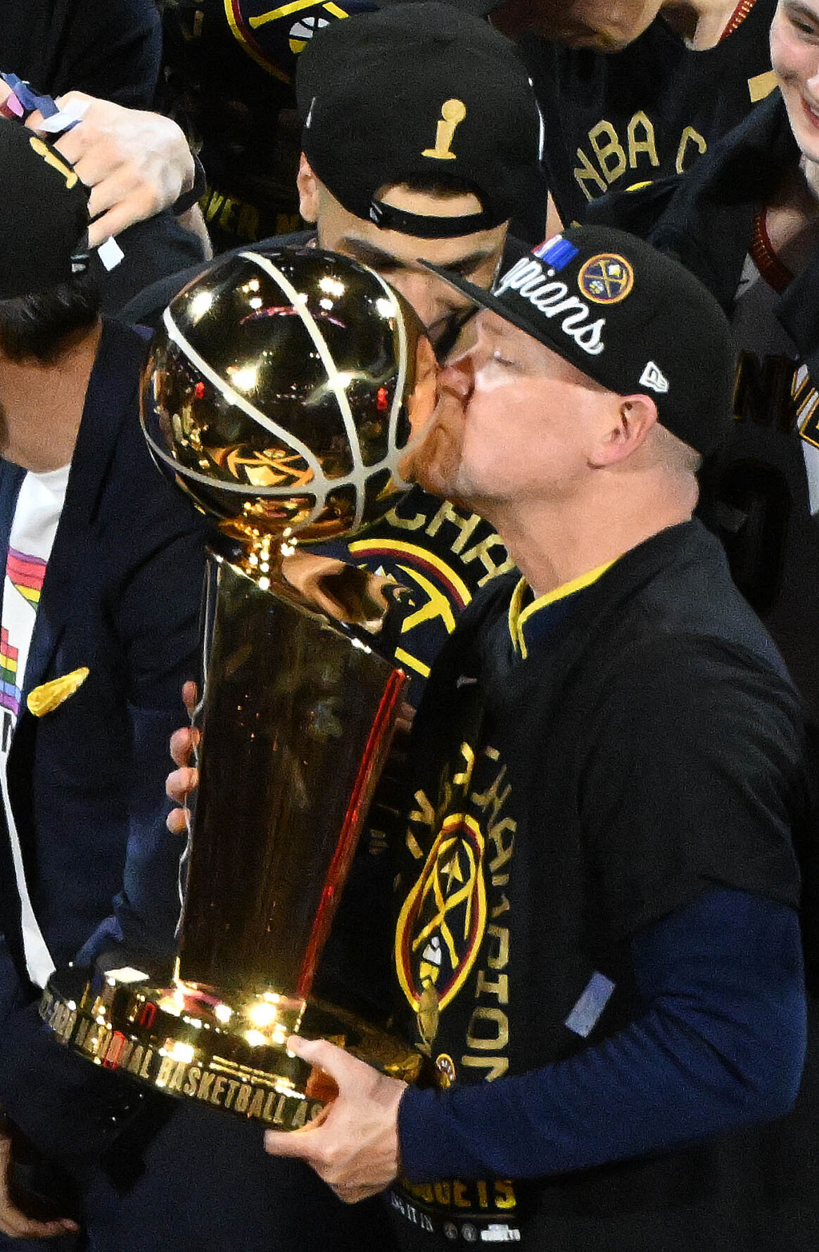 Nuggets Head Coach Michael Malone kisses the trophy during the championship celebration at Ball Arena on Monday, June 12, 2023. (Photo by Jerilee Bennett, The Gazette)