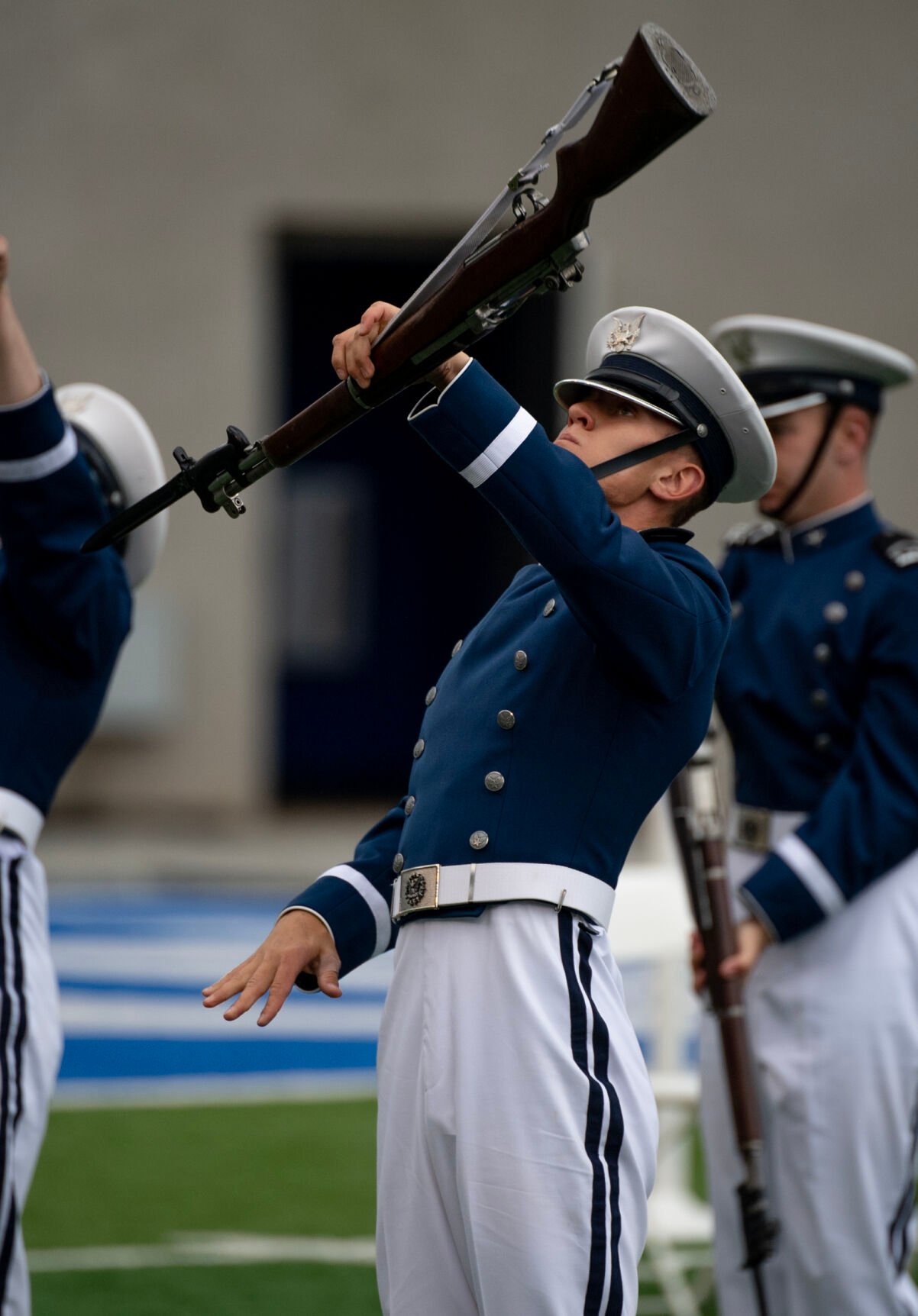 The cadet honor guard drill team performs before the Air Force Academy graduation ceremony at Falcon Stadium on Thursday, June 1, 2023. (Parker Seibold, The Gazette) (Parker Seibold)
