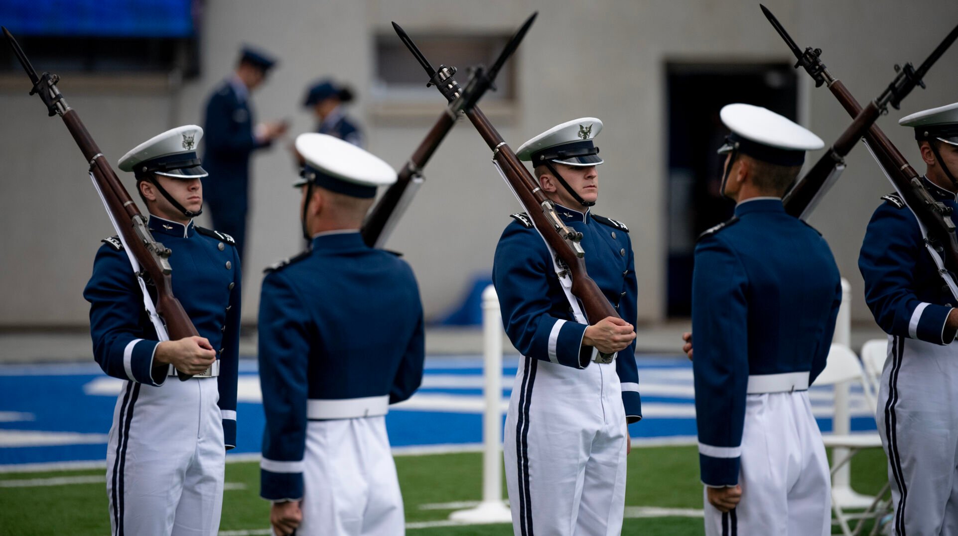 The cadet honor guard drill team performs before the Air Force Academy graduation ceremony at Falcon Stadium on Thursday, June 1, 2023. (Parker Seibold, The Gazette) (Parker Seibold)