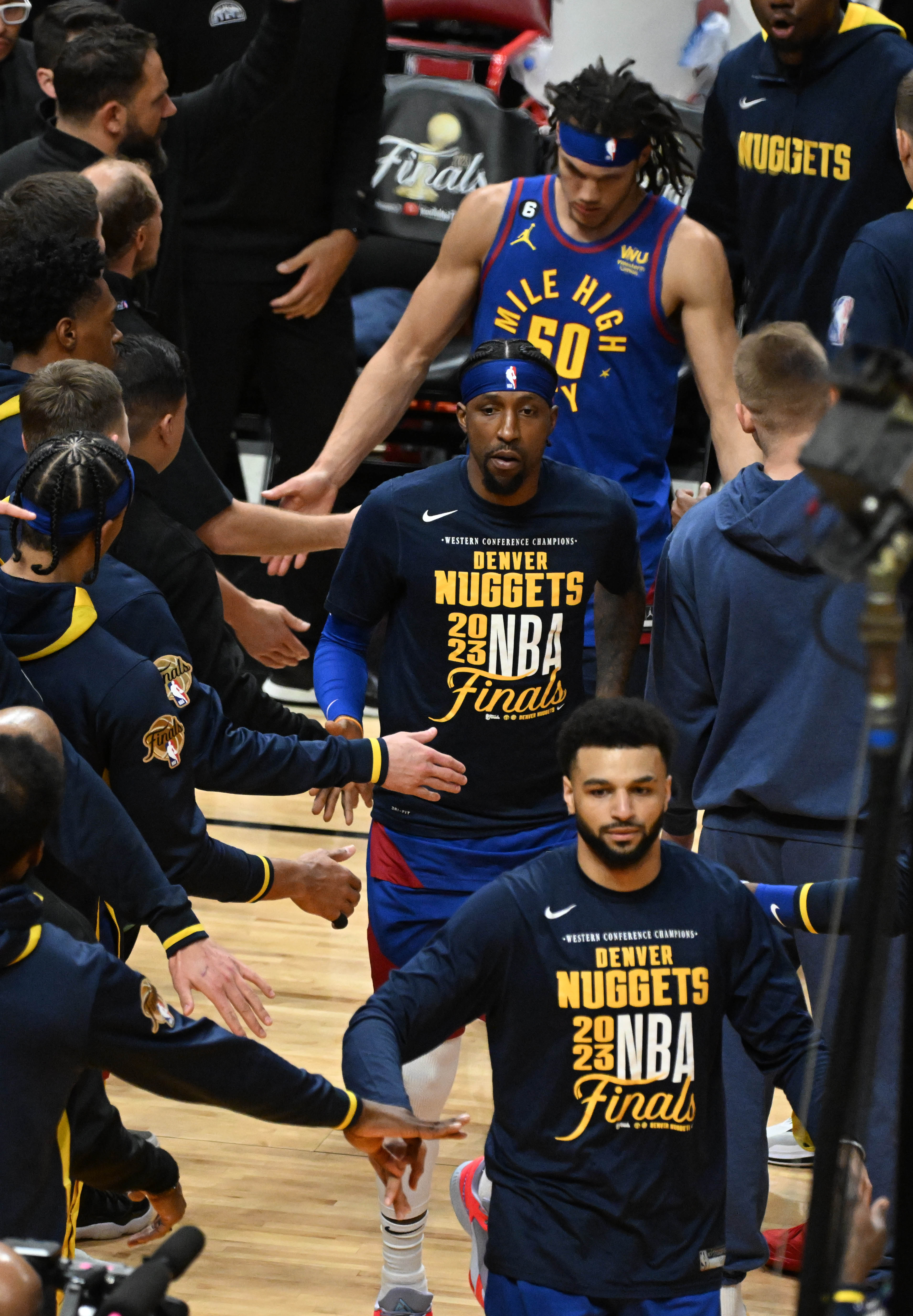 Denver Nugget starters Denver Nuggets guard Jamal Murray (27), Kentavious Caldwell-Pope, and Denver Nuggets forward Aaron Gordon (50) take the floor at the beginning of the game 3 at at the Kaseya Center in Miami before Game 3 of the NBA Finals on Wednesday, June 7, 2023. (Photo by Jerilee Bennett, The Gazette)