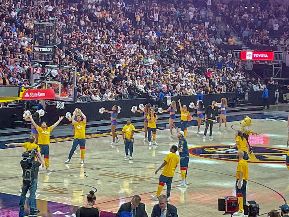 Rocky the mascot takes his half-court shots after the third quarter of the Denver Nuggets' NBA Finals Game 3 watch party at Ball Arena on Wednesday night. (John Moore/The Denver Gazette)