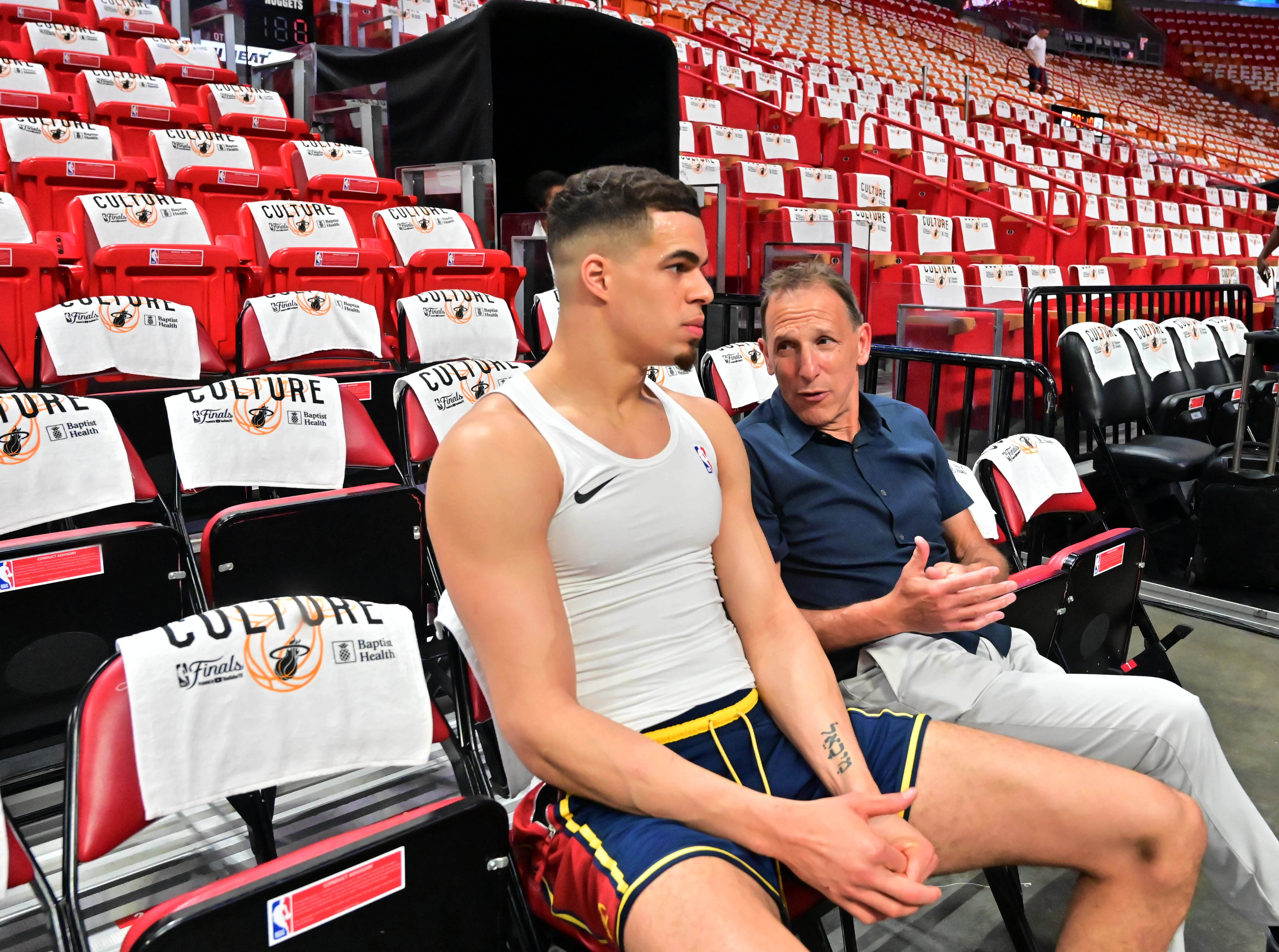 Denver Nuggets forward Michael Porter Jr. (1) gets some one-on-one mentoring before warming up at the Kaseya Center in Miami before Game 3 of the NBA Finals on Wednesday, June 7, 2023. (Photo by Jerilee Bennett, The Gazette)