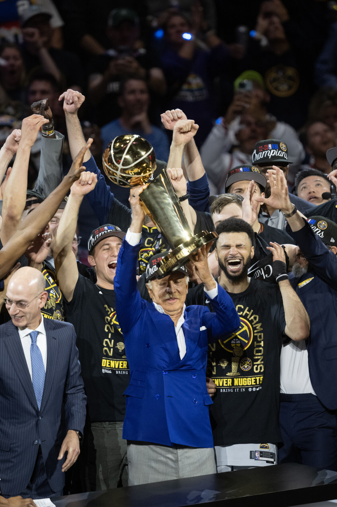 Denver Nuggets owner Stan Kroenke hoists the Larry O’Brien Championship Trophy after a 94-89 win over the Miami Heat in Game 5 of the NBA Finals on Monday, June 12, 2023, at Ball Arena in Denver. (Timothy Hurst/Denver Gazette) (Timothy Hurst/Denver Gazette)