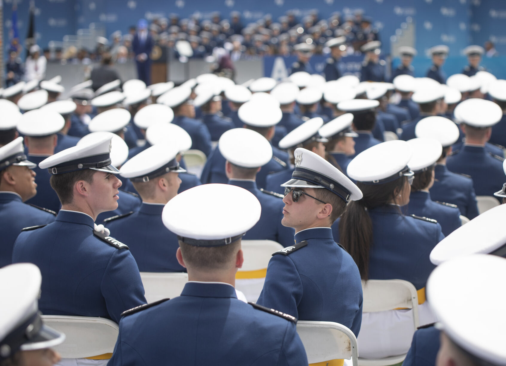 Graduating cadets take a moment to look back to find their friends and family at the U.S. Air Force Academy Class of 2023 Graduation at Falcon Stadium on the U.S. Air Force Academy campus in Colorado Springs, Co., on Thursday, June 1, 2023. (GabiBroekemaPhoto Interngabi.broekema@gazette.comhttps://secure.gravatar.com/avatar/9aa2a13da1acfaa50410cb37bf21fdb1?d=mm&r=g)