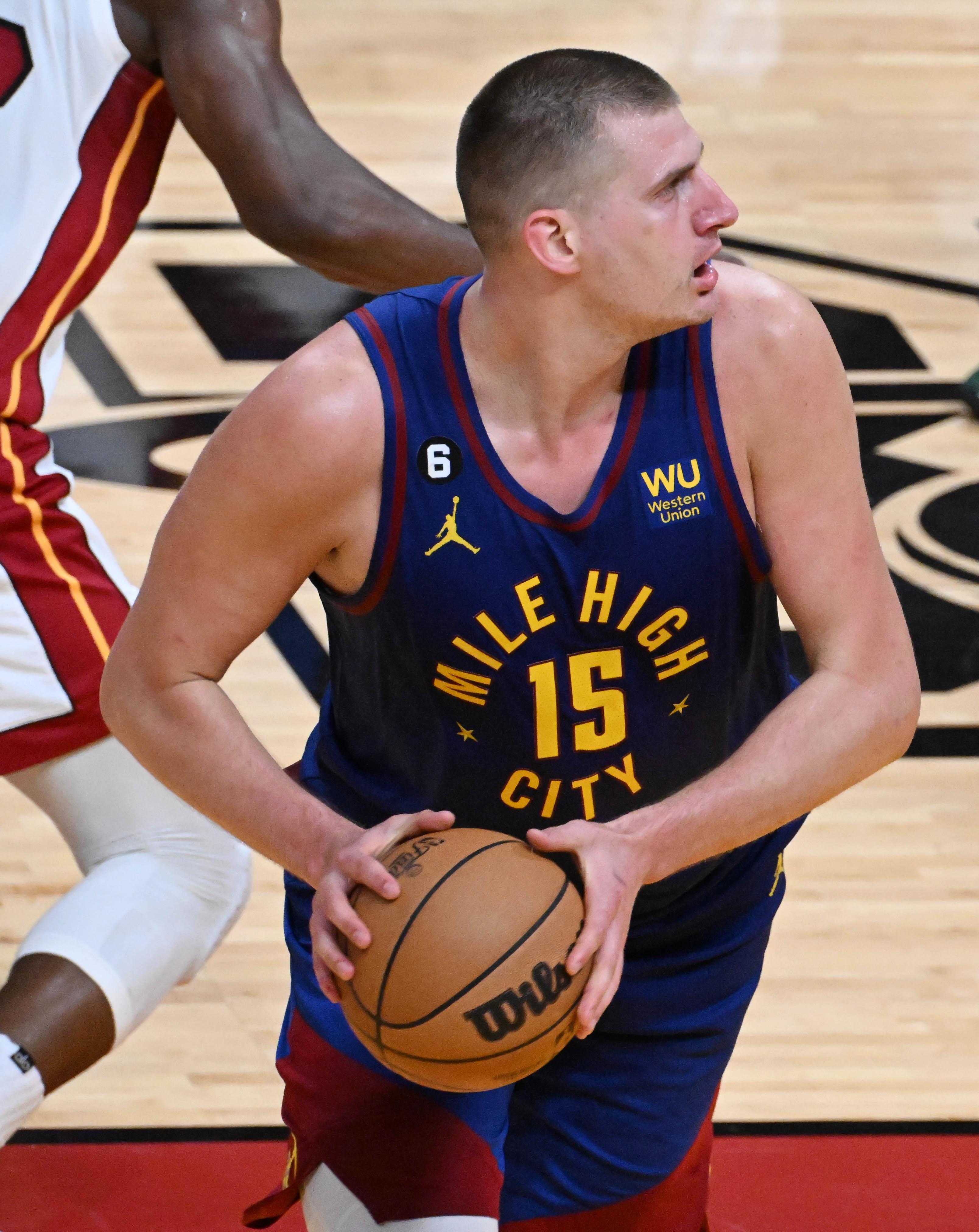 Denver Nuggets center Nikola Jokic (15) controls the ball during game 3 at Kaseya Center in Miami on Wednesday, June 7, 2023. (Photo by Jerilee Bennett, The Gazette)