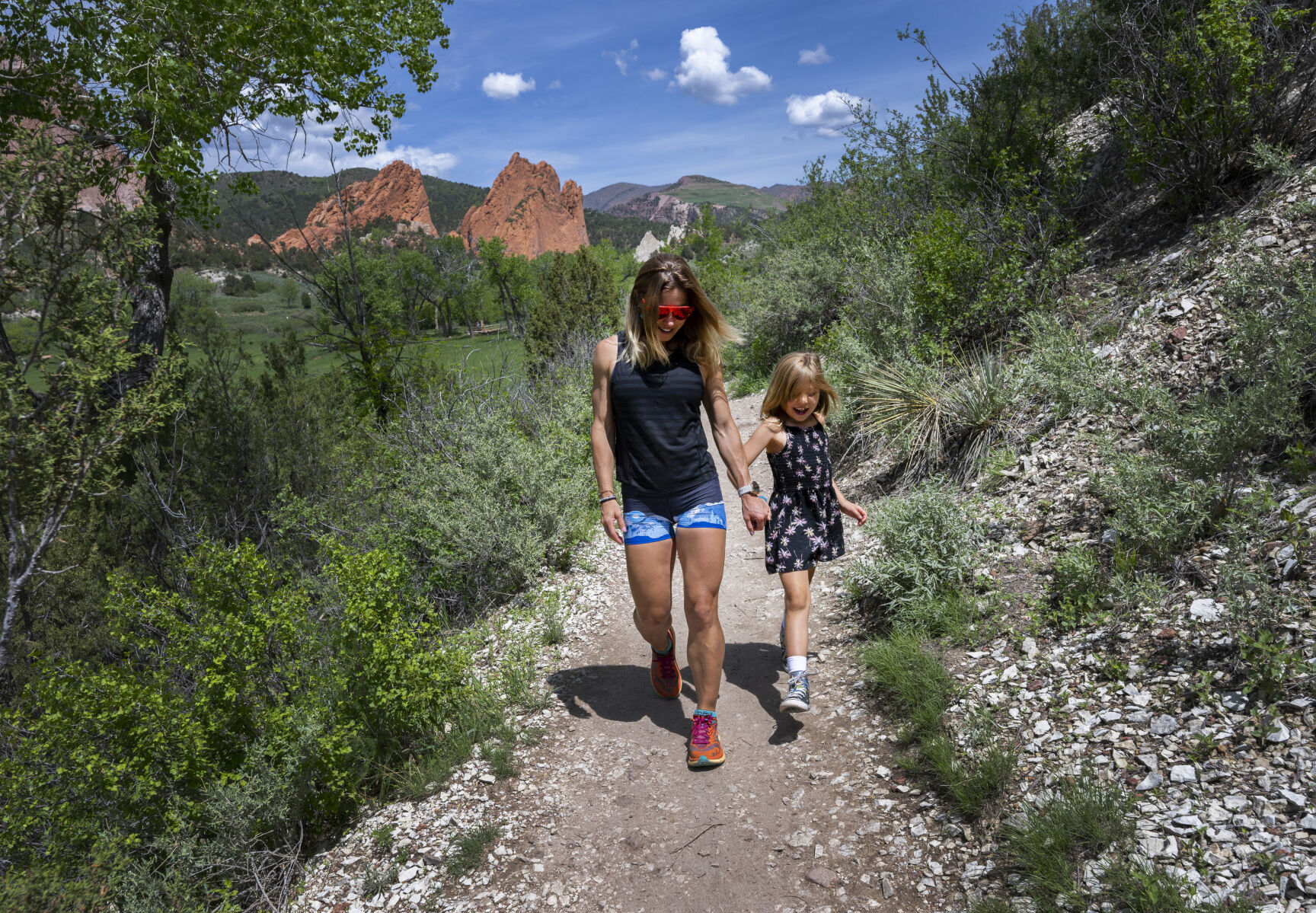 Ultrarunner Dreama Walton walks with her daughter, Adelaide, 7, through Garden of the Gods Park in Colorado Springs. Walton said she was hesitant to share her story in the documentary “Dreama Team” but decided people, including her daughter, could benefit from the lessons she has learned. (photos by Christian Murdock, The Gazette)