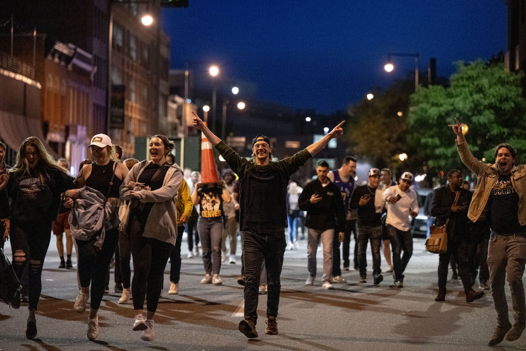People celebrate the Nuggets’ NBA championship after the game on Monday, June 12, 2023. (Parker Seibold, The Gazette) (Parker Seibold)