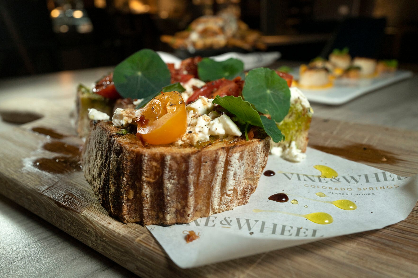 Vine and Wheel Restaurant (Located at: 616 S. Tejon) “Caprese Bruschetta, Seared Scallops and Duck Fat Fries” Wednesday May 24, 2023. Photo by Jeff Kearney. (Jeff Kearney)