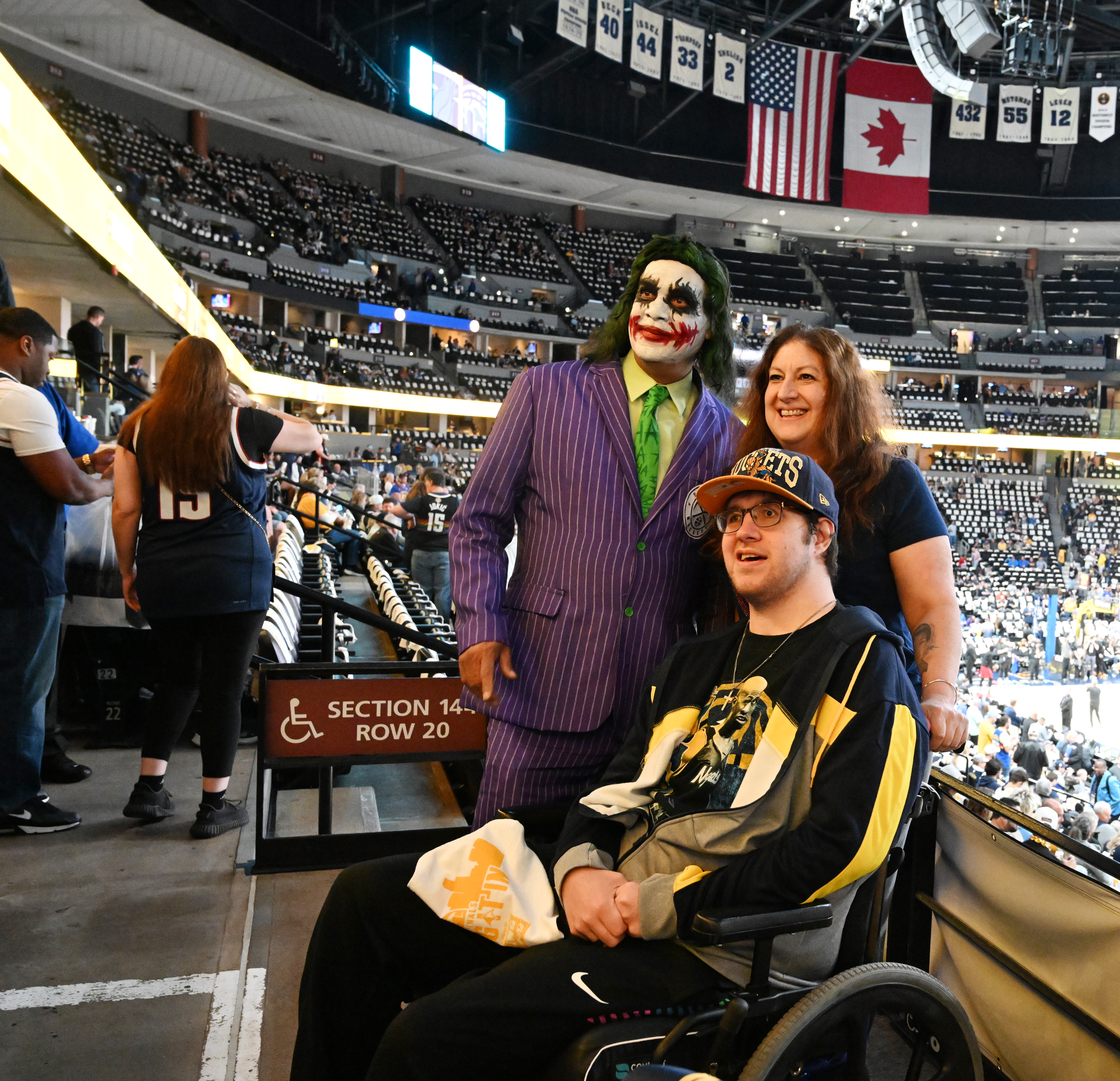 Another Joker poses with season ticket holders before game 5 of the NBA Finals at Ball Arena on Monday, June 12, 2023. (Photo by Jerilee Bennett, The Gazette)