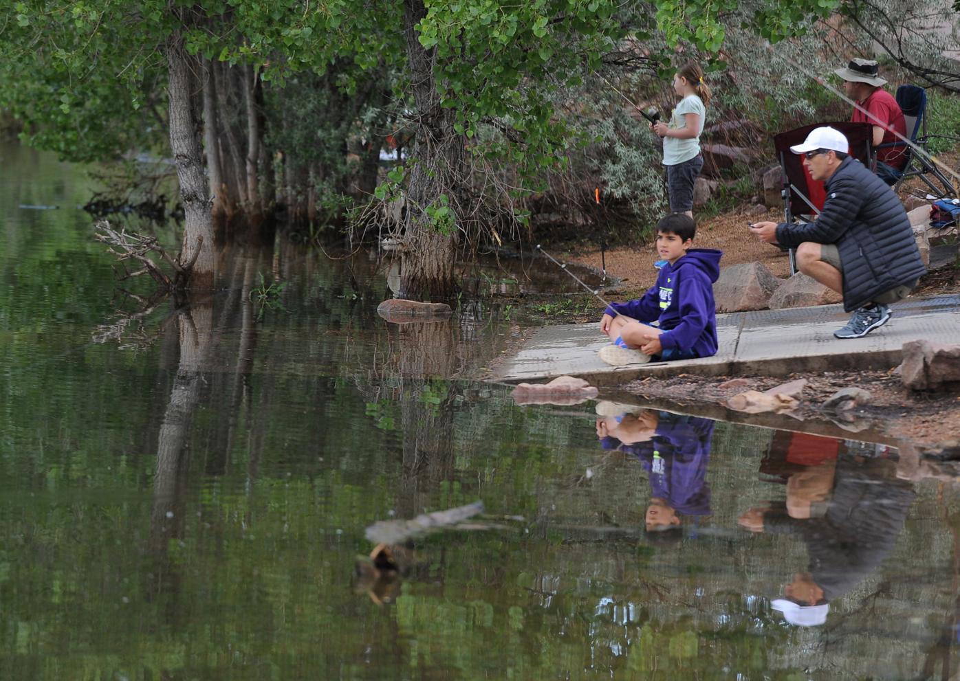 The fishing is free this weekend, so no licenses are needed. Fishing poles were given away to the first 600 kids at Quail Lake on Saturday, June 6, 2015. Volunteers with Colorado Parks and Wildlife assembled all the poles and instructed kids on how to u...