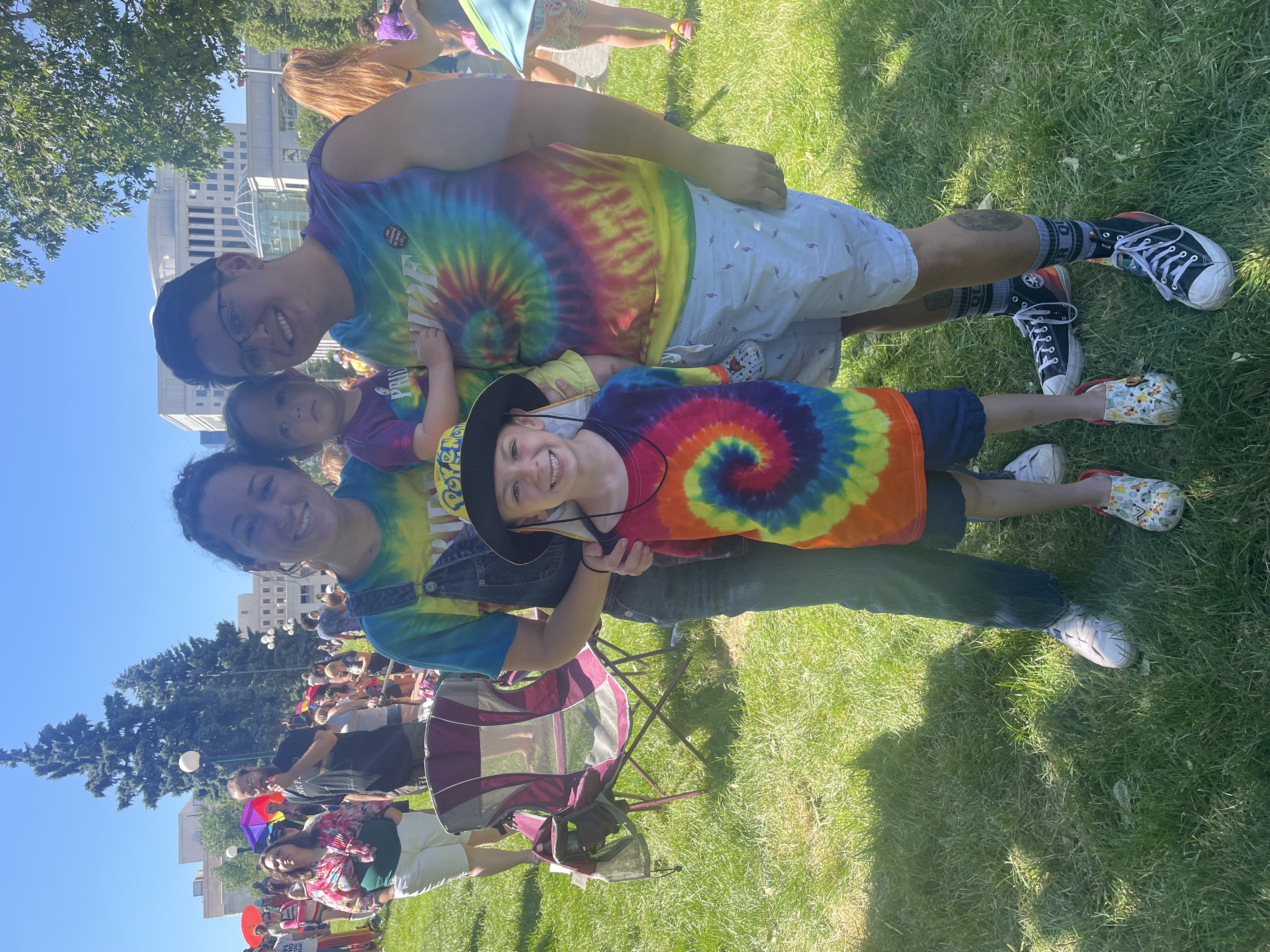 Michaela (left) and Sam Gallegos brought their two children to Denver's PrideFest parade on Sunday, June 25, 2023. They moved to Colorado from Chicago less than a year ago, so this summer's festival is their first Pride in Denver. (Julia Cardi/The Denver Gazette.)