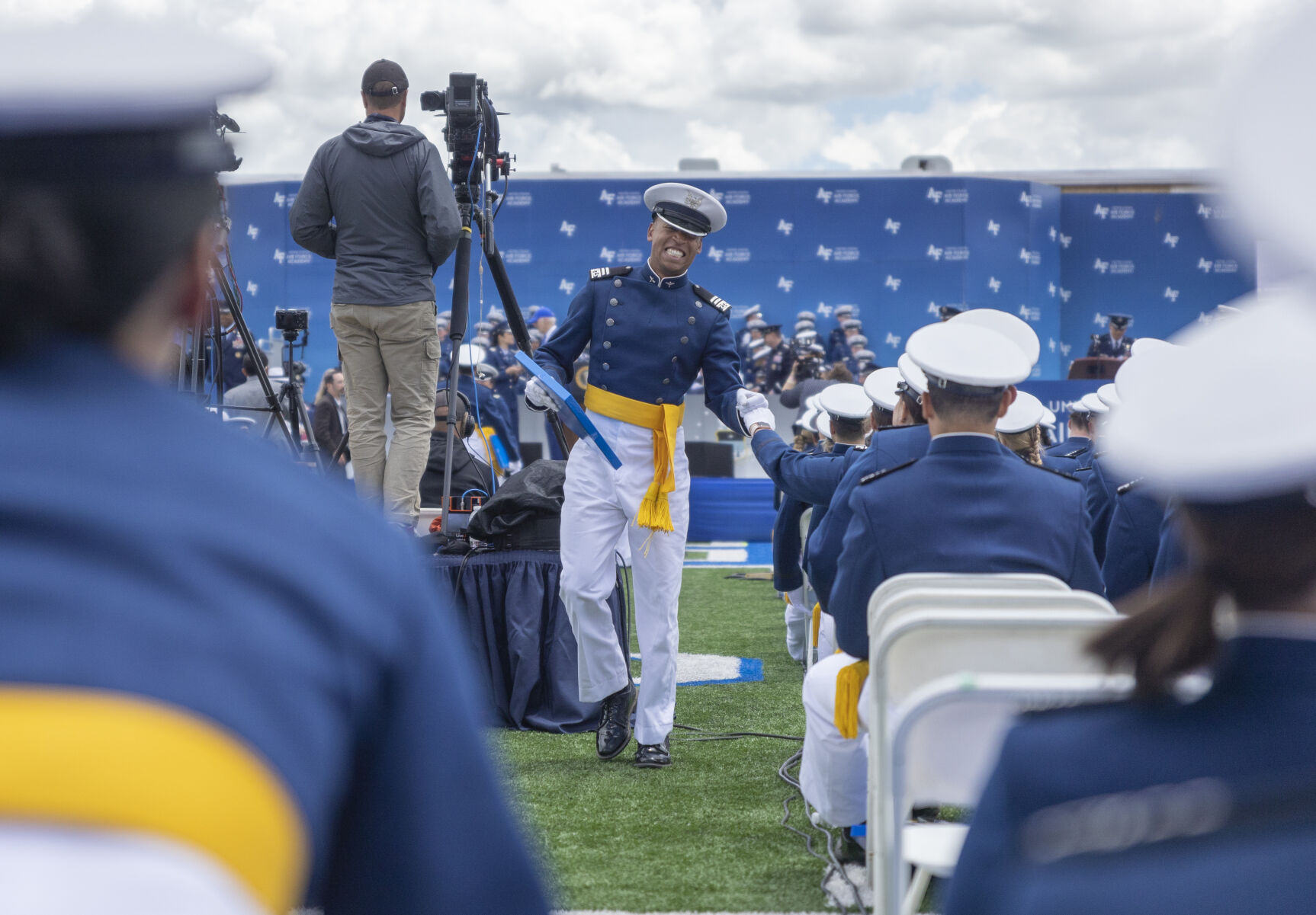 Graduating cadets fist bumped and hugged their fellow cadets after receiving their diplomas during the U.S. Air Force Academy Class of 2023 Graduation at Falcon Stadium on the U.S. Air Force Academy campus in Colorado Springs, Co., on Thursday, June 1, 2023. (GabiBroekemaPhoto Interngabi.broekema@gazette.comhttps://secure.gravatar.com/avatar/9aa2a13da1acfaa50410cb37bf21fdb1?d=mm&r=g)