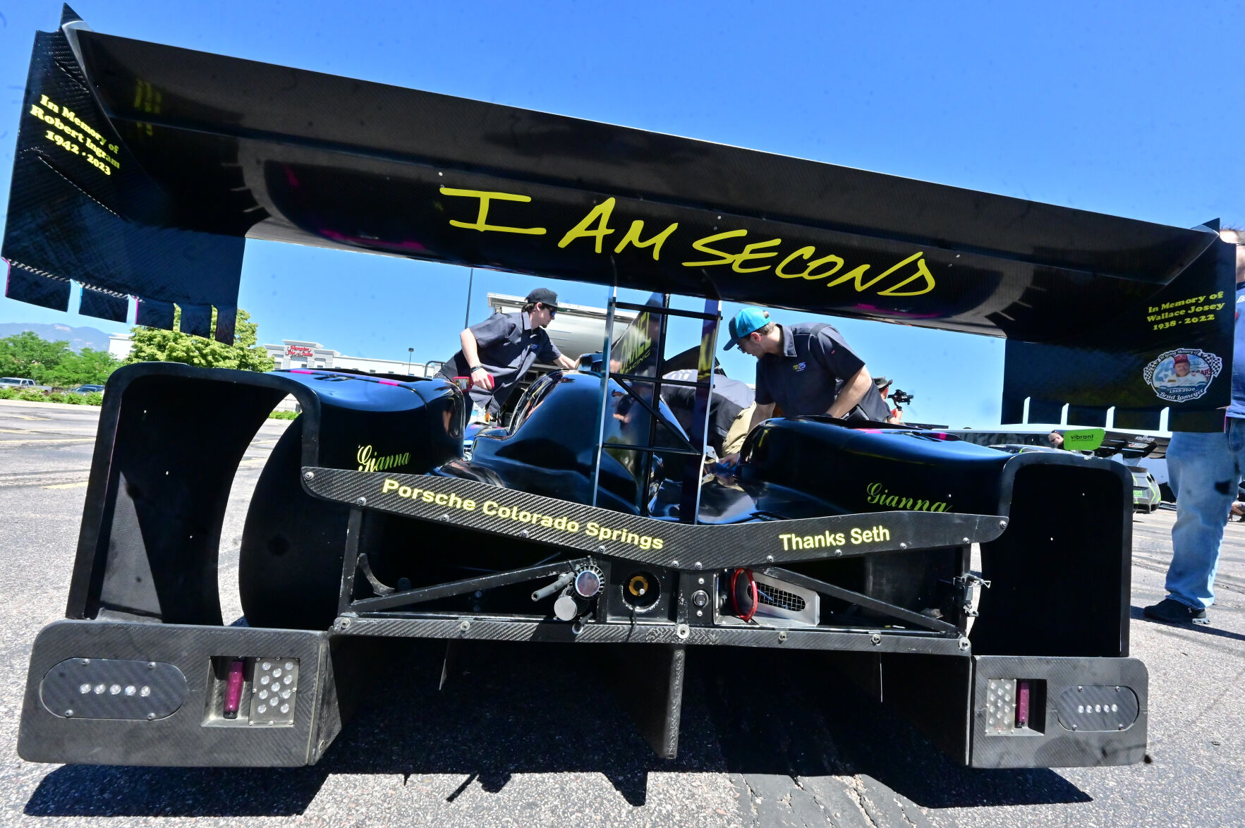 Dakota Wickstrum (right) helps other team members get his dad’s 2016 Axel Riley Ave. LMP3 race car ready for inspection for this week’s Pike’s Peak International Hill Climb. Dakota’s dad, Don Wickstrum, is the driver of the car in the Unlimited division and he is also known as the Fastest Pastor. The inspections were held at the Broadmoor World Arena on Monday, June 19, 2023. Practices and qualifying will be held on Tuesday, Wednesday and Thursday mornings. The Fan Fest will be held downtown on Friday from 5 p.m. to 9 p.m. The race finals will be on Pikes Peak all day Sunday. (Photo by Jerilee Bennett, The Gazette)