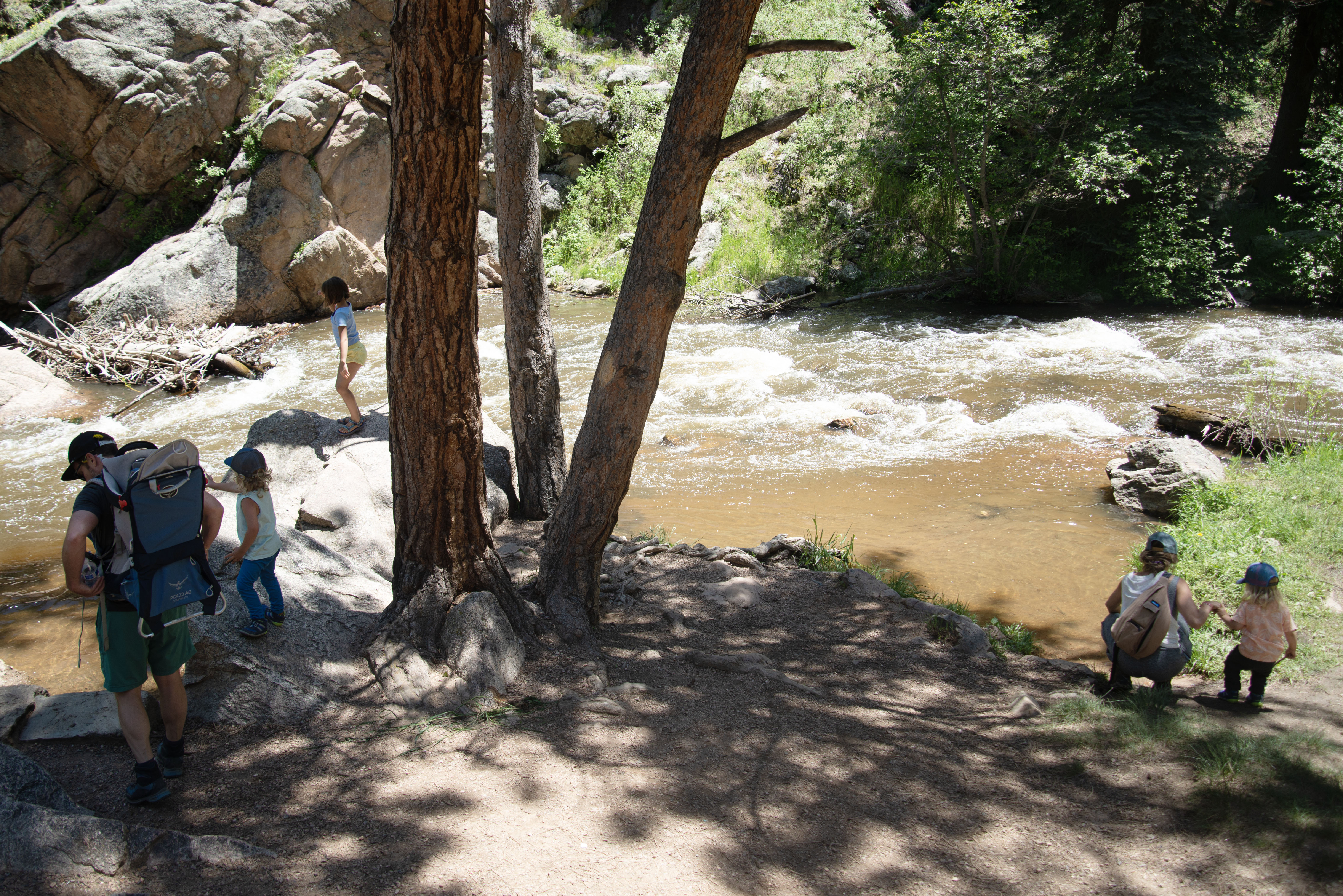 Josh Craver, left, and Nicole Zinke, second from right, explore a section of Bear Creek accessible from O'Fallon Park with their children on June 20, 2023. The city of Denver is naming a trail at the park after longtime guide Winston K. Walker. (TomHellauerMultimedia Producertom.hellauer@denvergazette.comhttps://denvergazette.com/content/tncms/avatars/f/9e/622/f9e6228a-3b6b-11ed-bf10-fbb71fa8e421.f54b911252c540f1d61709edc4727a39.png)