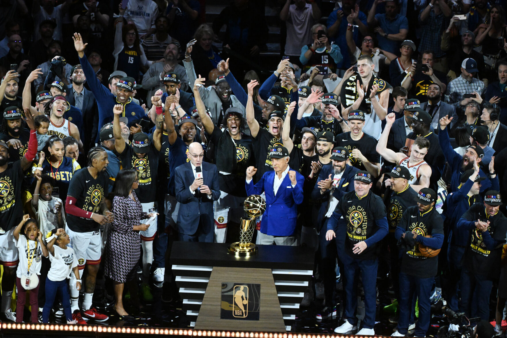 The Denver Nuggets celebrate on the stage after winning the NBA Championship on Monday, June 12, 2023. (Photo by Jerilee Bennett, The Gazette)