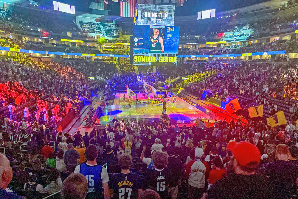 The scene from the Denver Nuggets' NBA Finals Game 3 watch party at Ball Arena on Wednesday night as players are being introduced. (John Moore/The Denver Gazette)
